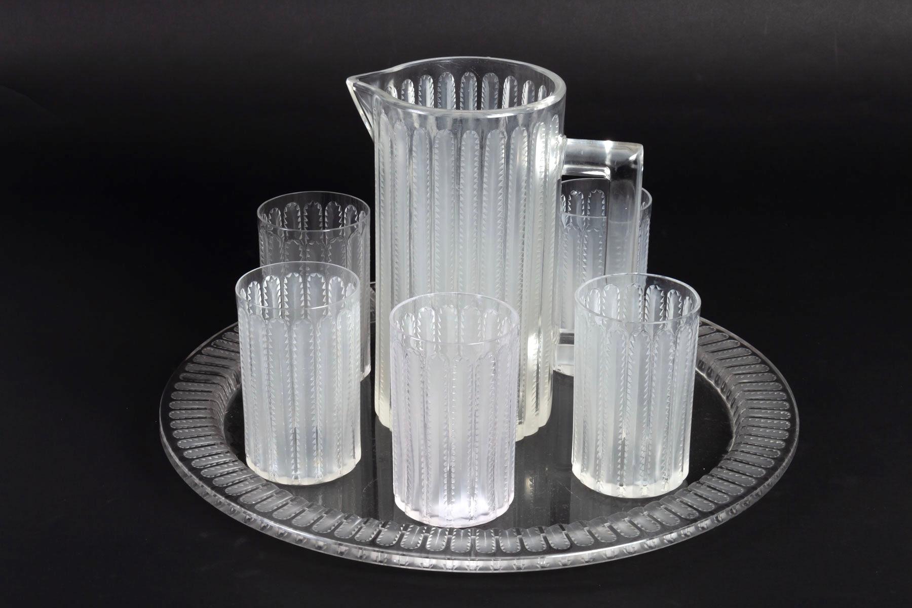 Orange set made by René Lalique in 1931. Model is named 