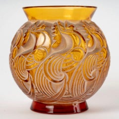 1931 René Lalique, Vase Le Mans Amber Yellow Glass with Beige Patina