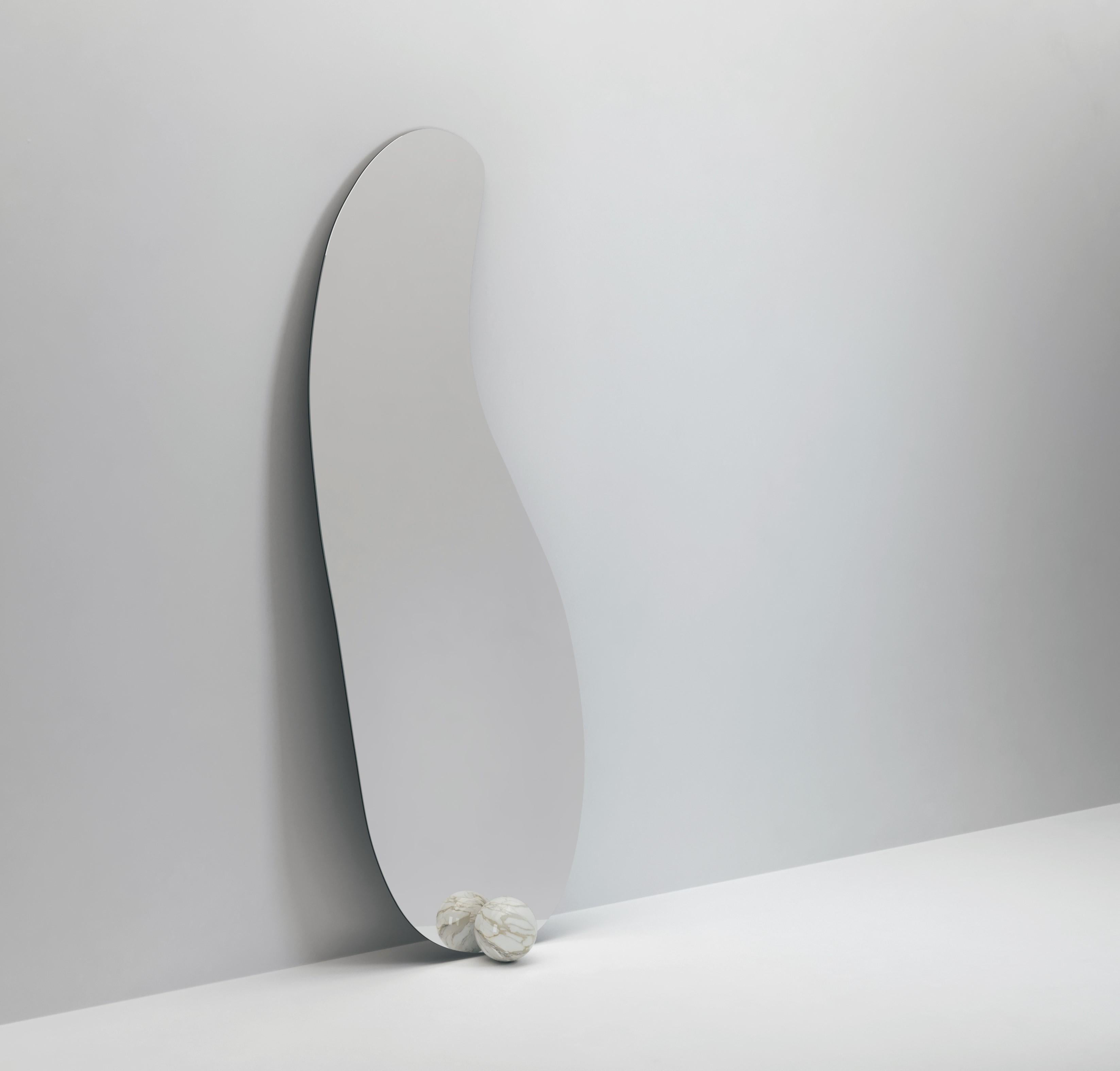 Inspired by the aesthetics and surrealism of Salvador Dali, the 1931 is an amorphous-shaped mirror, seemingly only held in place by a marble sphere. Available in a variety of different stones and metal finishes.

Dimension: 63 x 39.5 x 158.5 H