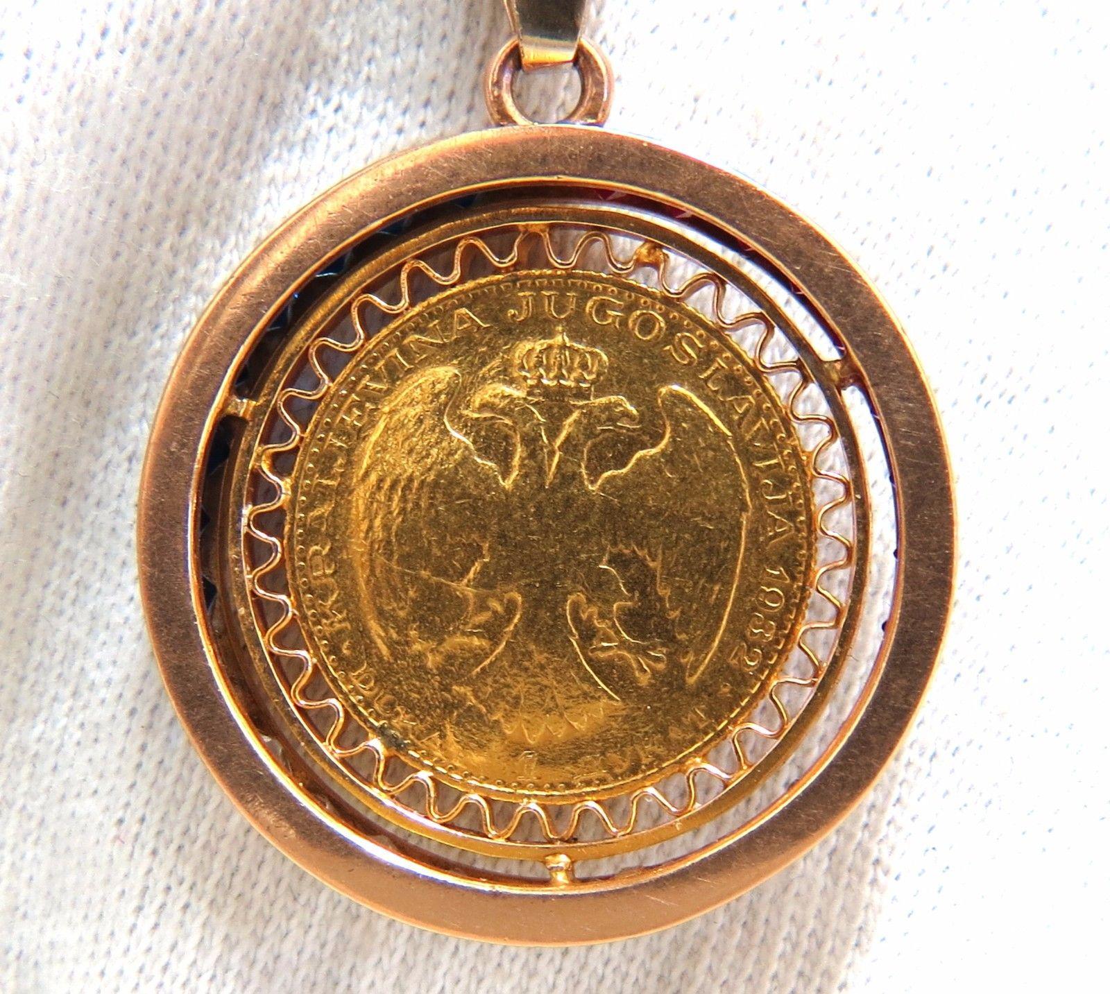1 Ducat.

22kt Yugoslavia 1932 King Alexander Coin Pendant

18kt. Handmade Frame

Grand total weight: 
12.5 grams
Measures:

1.2 inch (total diameter)

1.8 inch ( total length)

All Stones on side test Synthetic.