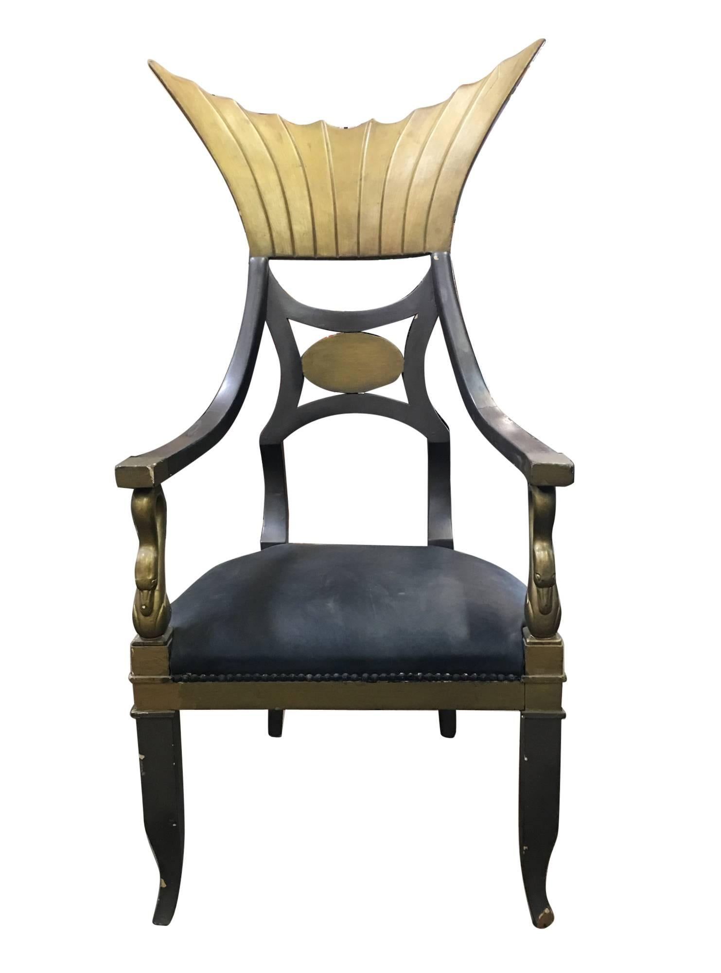 Original Egyptian throne chair used in the classic 1934 Claudette Colbert Film Cleopatra, from Paramount Studios. The dramatic chair, in which the star sat, can be seen in the scenes of Cleopatra's bed chamber. The chair embodies the style and