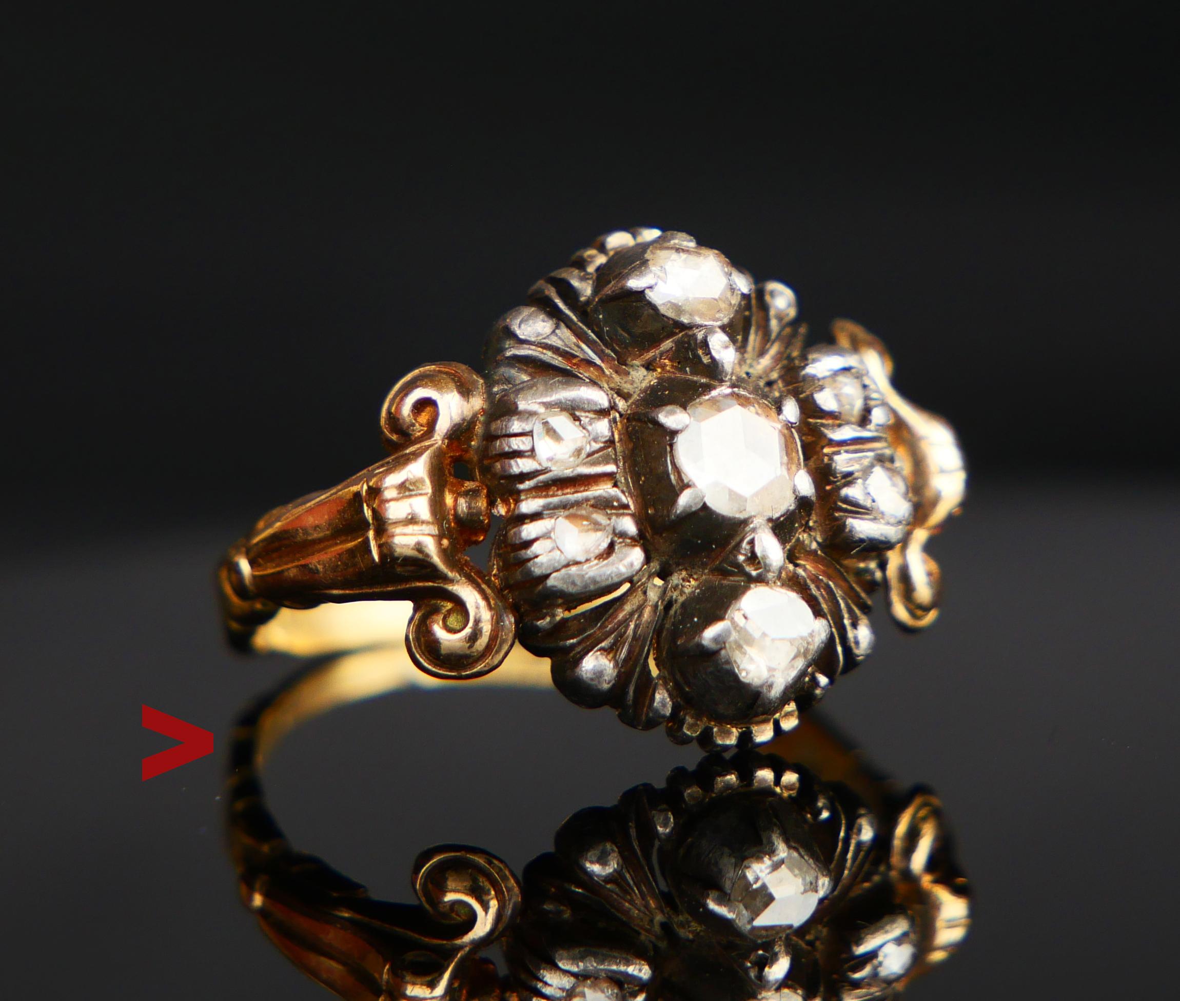 Beautiful Diamond Flower Ring, Renaissance styled. Set of Swedish hallmarks, 18K, maker's and date code H8 / hand-made in 1934, city of Malmö.

The carved band is solid 18ct Yellow Gold, the face side of the crown is made of Silver holding 7