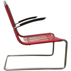 1934, W.H. Gispen para Gispen Culemborg, Raro Gispen 411 en cuerdas de plástico rojas