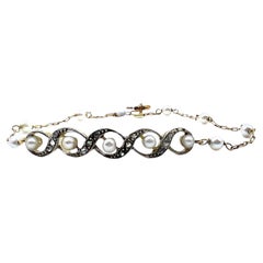 1935 Art-Déco-Armband aus Gelbgold und Platin mit Perlen und Diamanten im Art déco-Stil