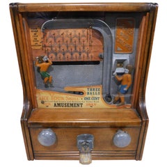 Joueur de football avec pièce de monnaie «cker and Catcher » opérant en 1935 par Baker Co. U.S.A.