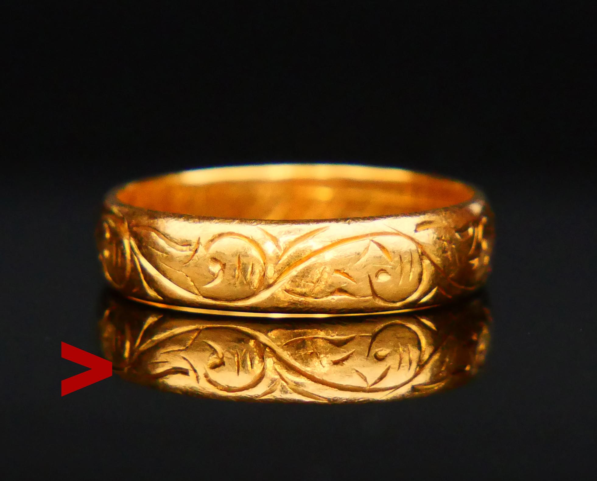 Beautiful 23K Antique Wedding Ring with continuous hand - engraved wavy floral ornament around the band.

Made in Sweden. Unknown workshop, city of Goteborg , hallmarked 23K.

Year mark: I8 / made in 1936. Engraved in Swedish 
