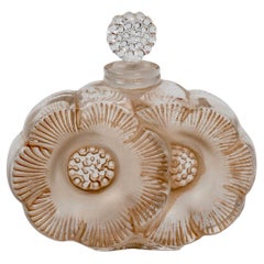 1935 René Lalique Flacon de parfum Deux Fleurs Verre à patine sépia