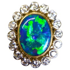 Australian Solid Black Opal 1.935ct and Diamond Ring in 18k Gold 