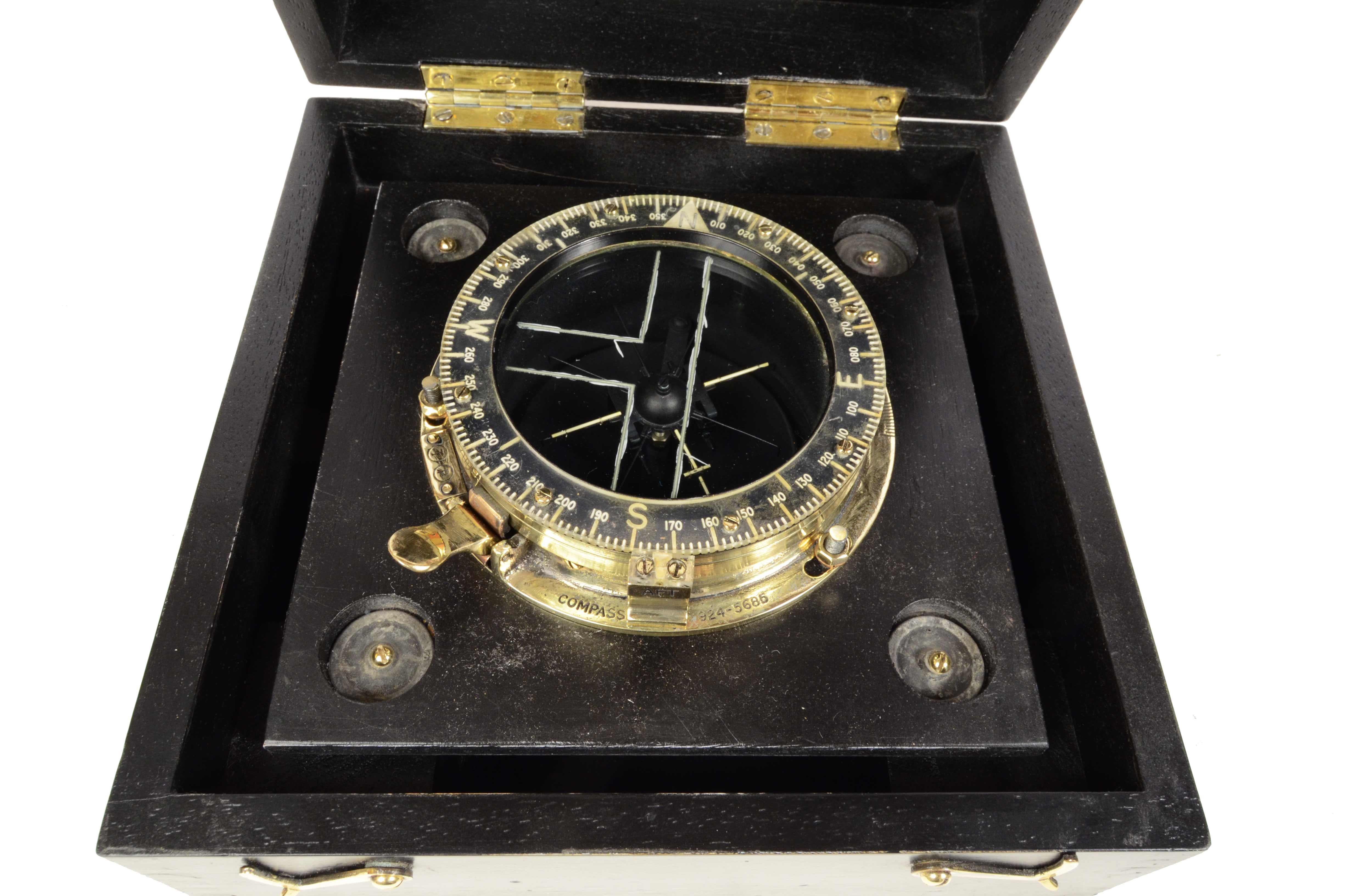 Brass antique compass complete with original wooden box where the compass is mounted on shock absorbers, signed supplied with the Boeing B-17 Flyin Fortress American bomber used during the Second World War and known as a “Flying Fortress”. This