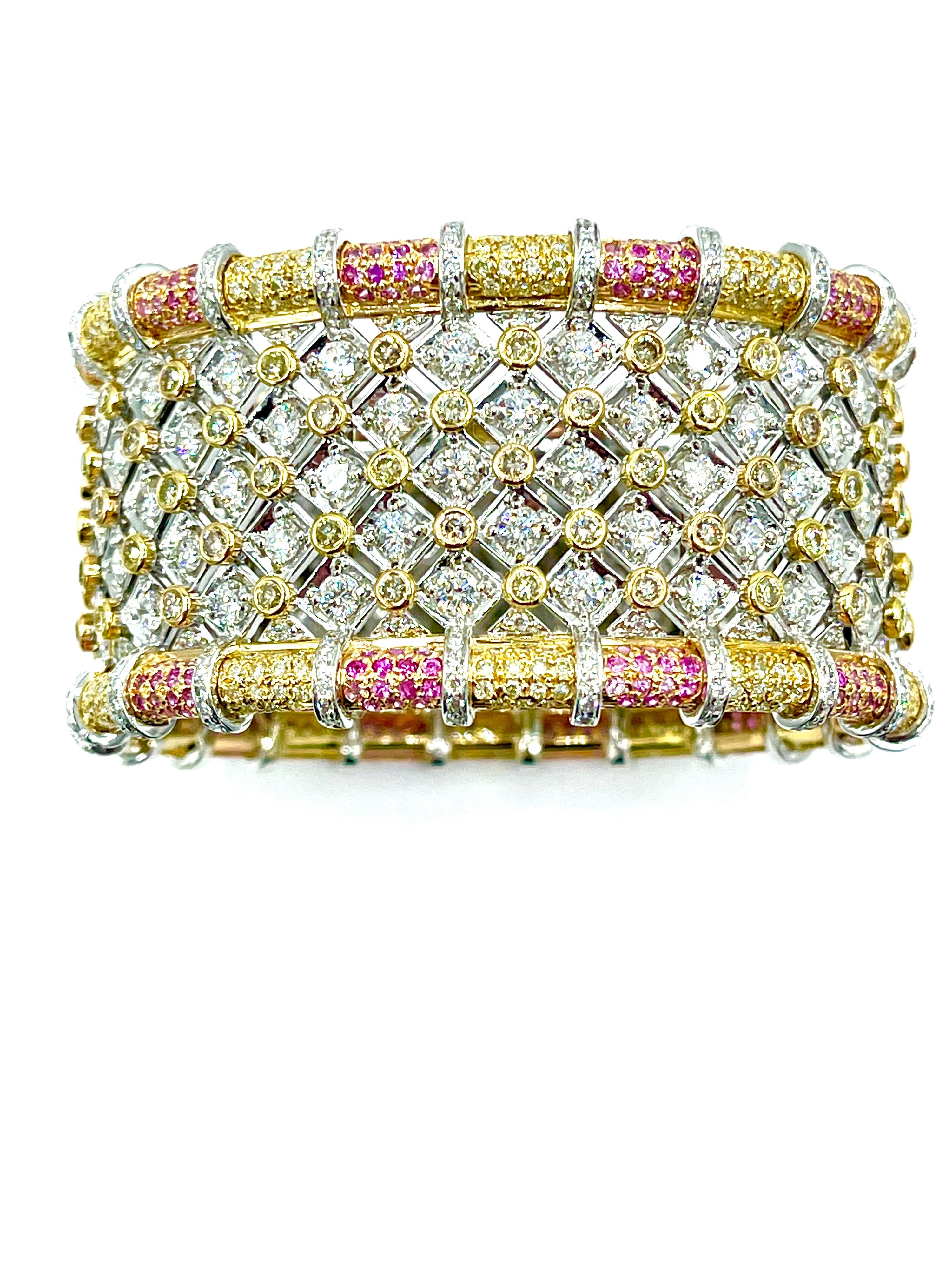 This is an absolutely stunning bracelet!  The bracelet contains a total of 836 round brilliant Diamonds for a total weight of 19.36 carats.  The Diamonds are prong set and bezel set all the way around the entire bracelet in white and yellow 18K