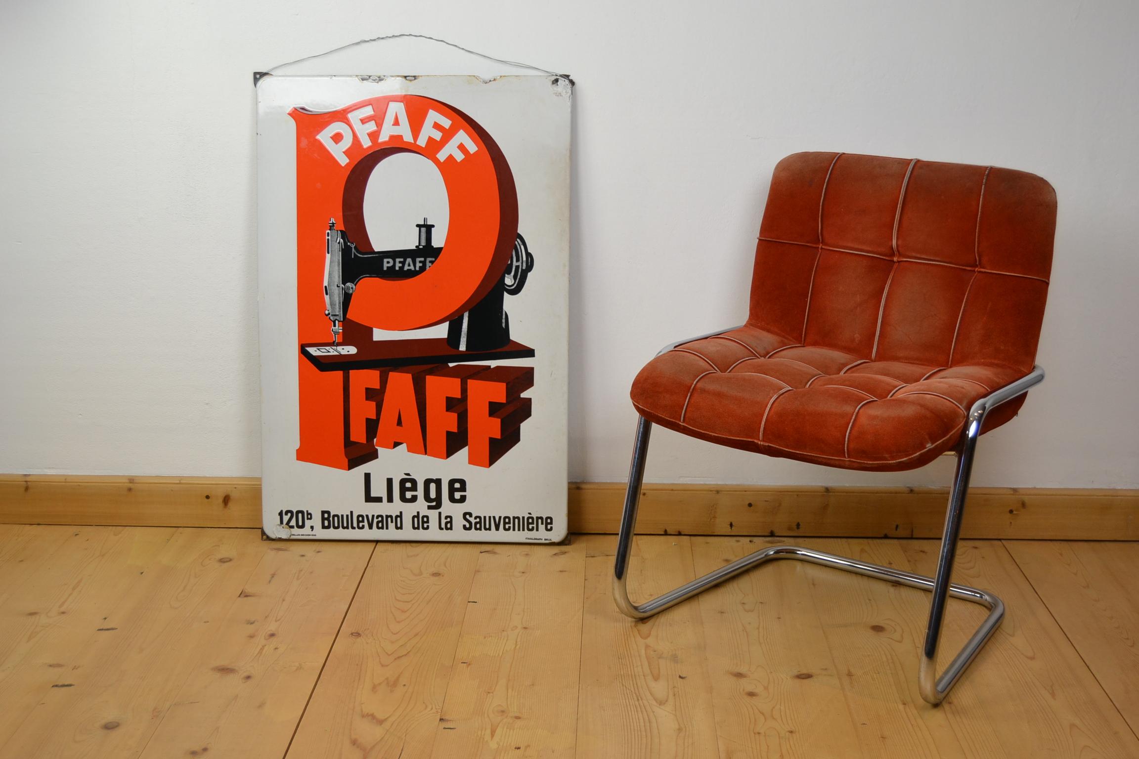 Large enamel advertising sign for sewing machines of the brand Pfaff.
This porcelain sign has a great design with the colors white, black and orange and a Pfaff Quilter in the middle. It was made in Brussels in 1936.
Despite the age of more than