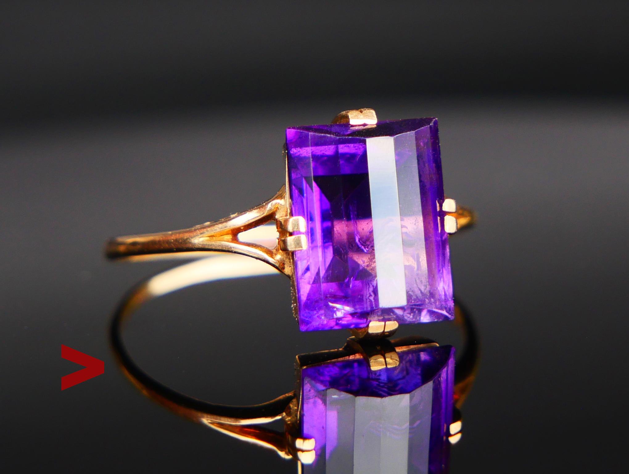 A Ring in solid 18K Gold for every day Art - Deco period styled with a thin band and bezel with claws decorated with spectacular natural Purple Amethyst measuring 10mm x 8 x 5.8 mm deep / about 4ct with flaws and inclusions typical for natural