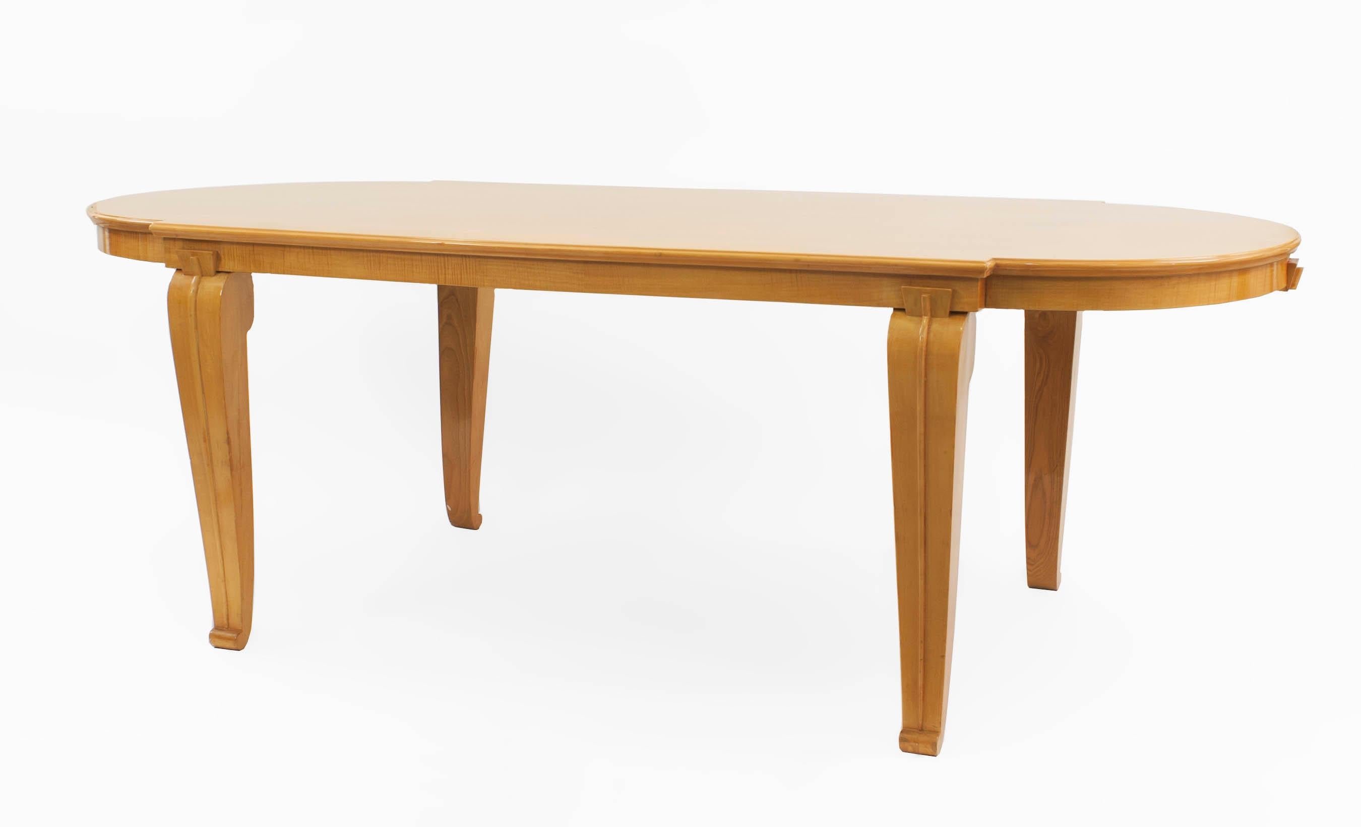 French Mid-Century (1938) sycamore dining table having rounded ends with scroll form legs (by ANDRE ARBUS) (ref: ARBUS, by Brunhammer, pg 154-5;)
