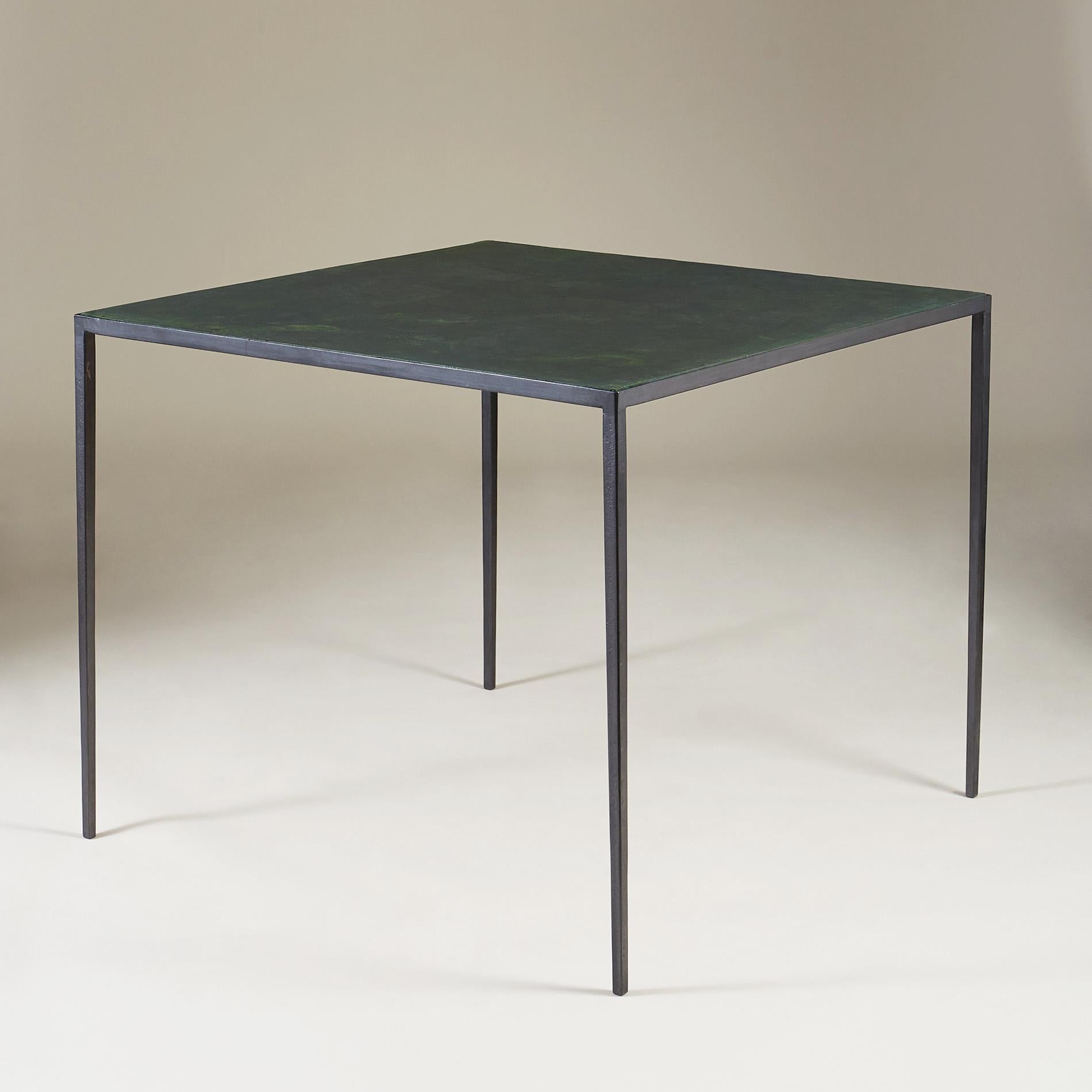 A games table of exceptional quality, demonstrating exactly the designer's mastery of perfectly balanced Minimalist lines. A perfect example of why Jean-Michel Frank is internationally known as the master of minimalism. The table has patinated iron
