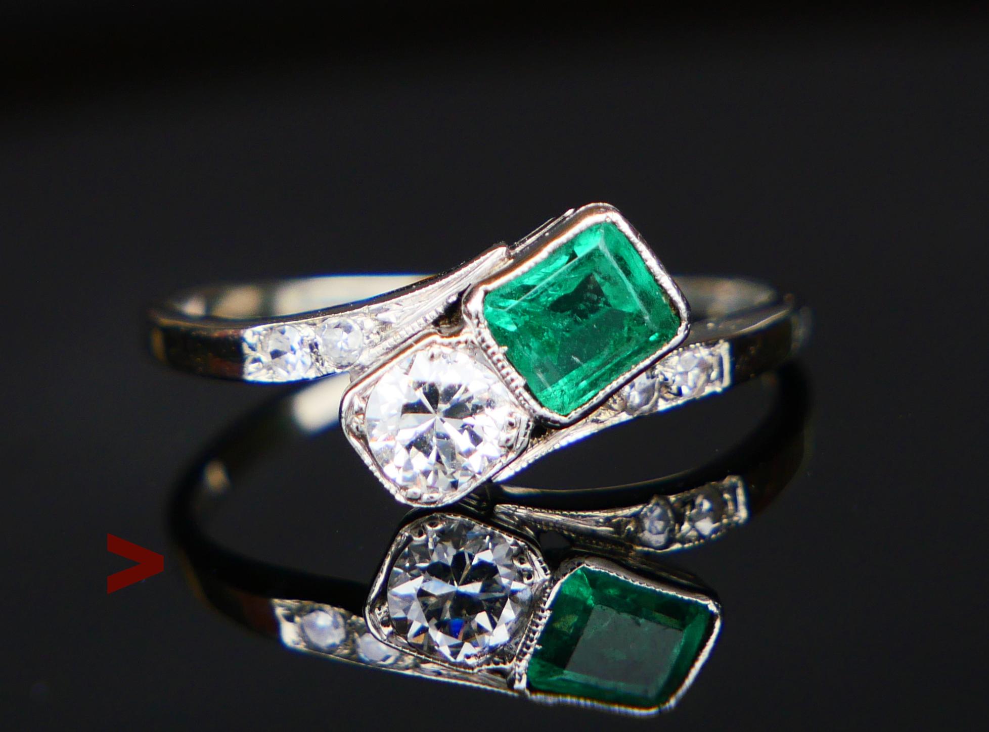Elegant Emerald and Diamonds  Ring with curved band in solid 18ct White Gold with  bezel set natural emerald cut Emerald stone 4.5 mm x 4 mm x 3.2 mm deep / ca. 0.5 ct of vivid Green color and old European cut natural Diamond Ø 3.75 mm x 2.35 mm