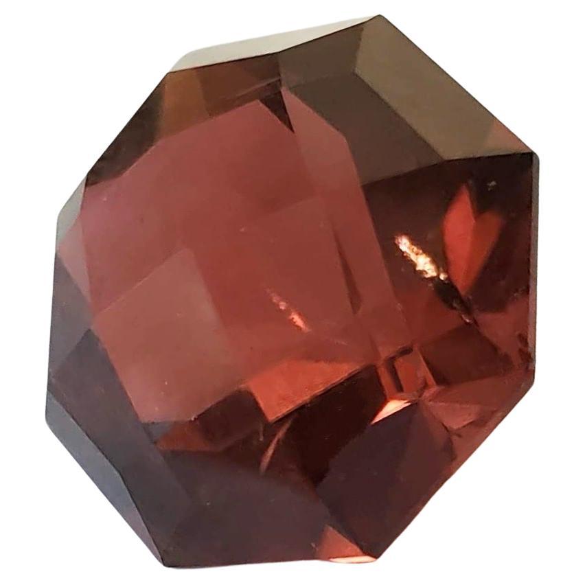 19.38ct Deep Red Rubellite Loose stone, measuring approximately 17.2x16.4x12.4
Crafted by Mother Nature herself, this exceptional gemstone boasts an enchanting deep red hue that captures the essence of passion and vitality. The remarkable round cut