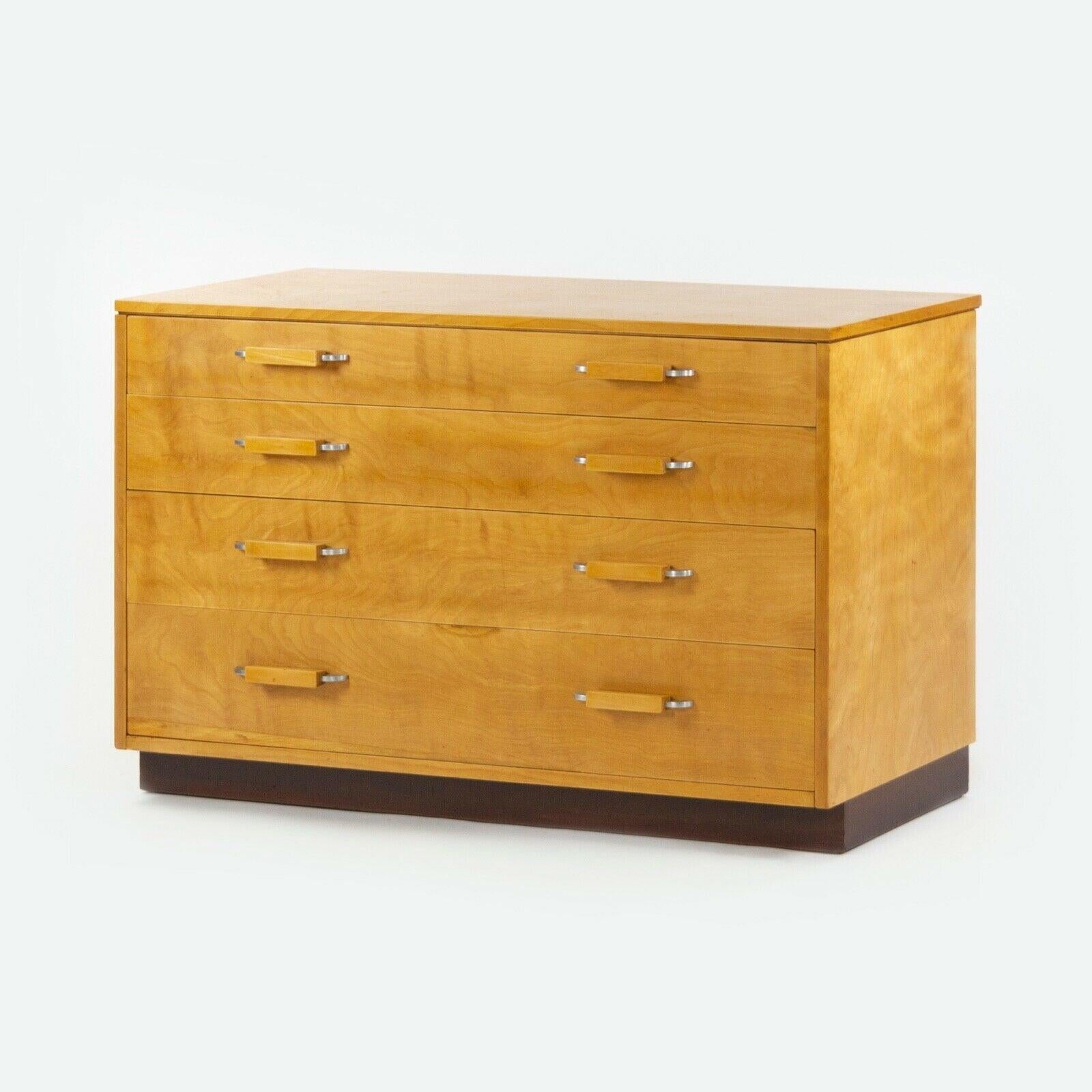 Listed for sale is a gorgeous and beautifully restored Eliel Saarinen, J. Robert Swanson, and Pipsan Saarinen Swanson 4-drawer dresser, produced by Johnson Furniture Co. circa 1939. This example came from an Ithaca, NY estate and has been lovingly