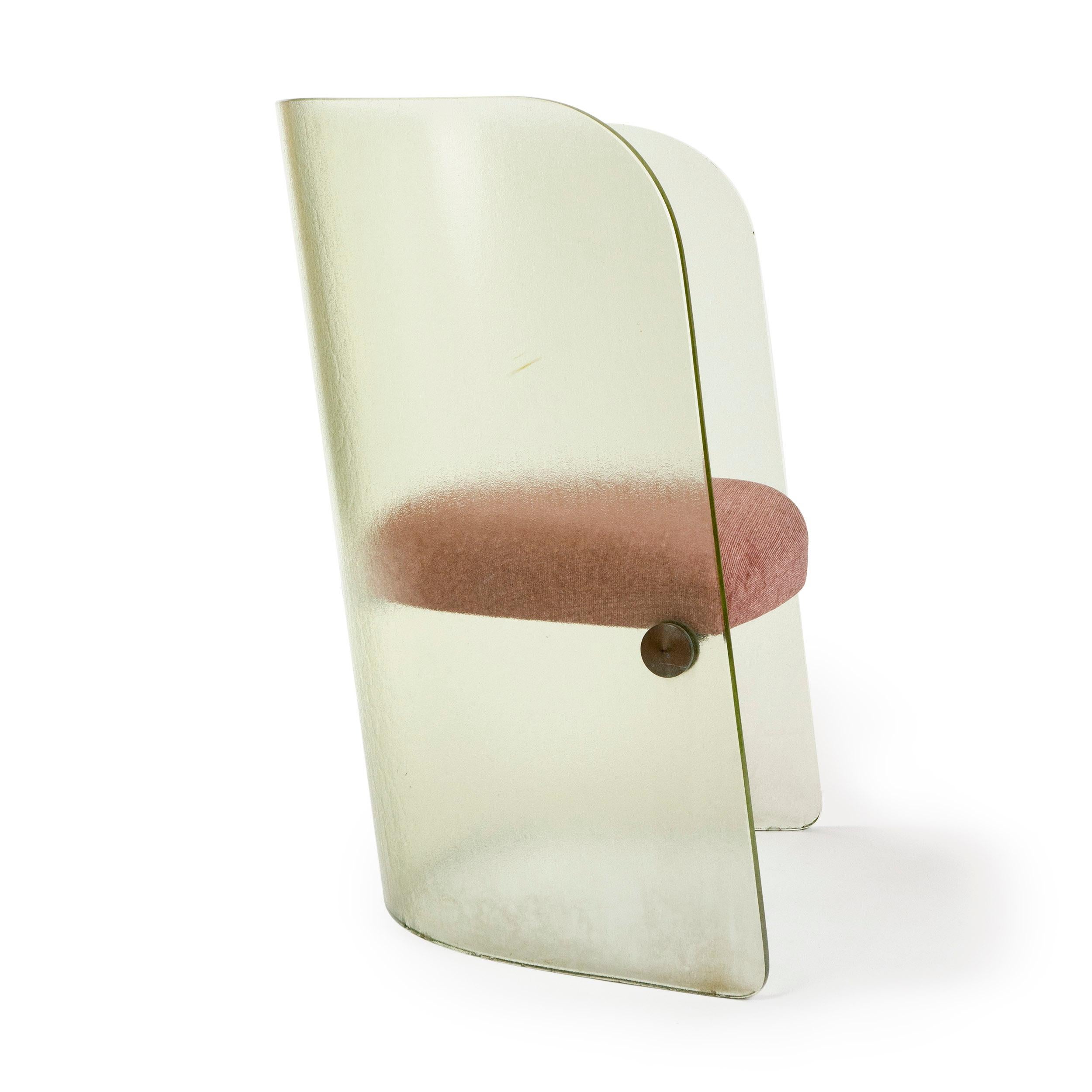 A textured glass armchair designed by Louis Dierra with a newly upholstered seat.
