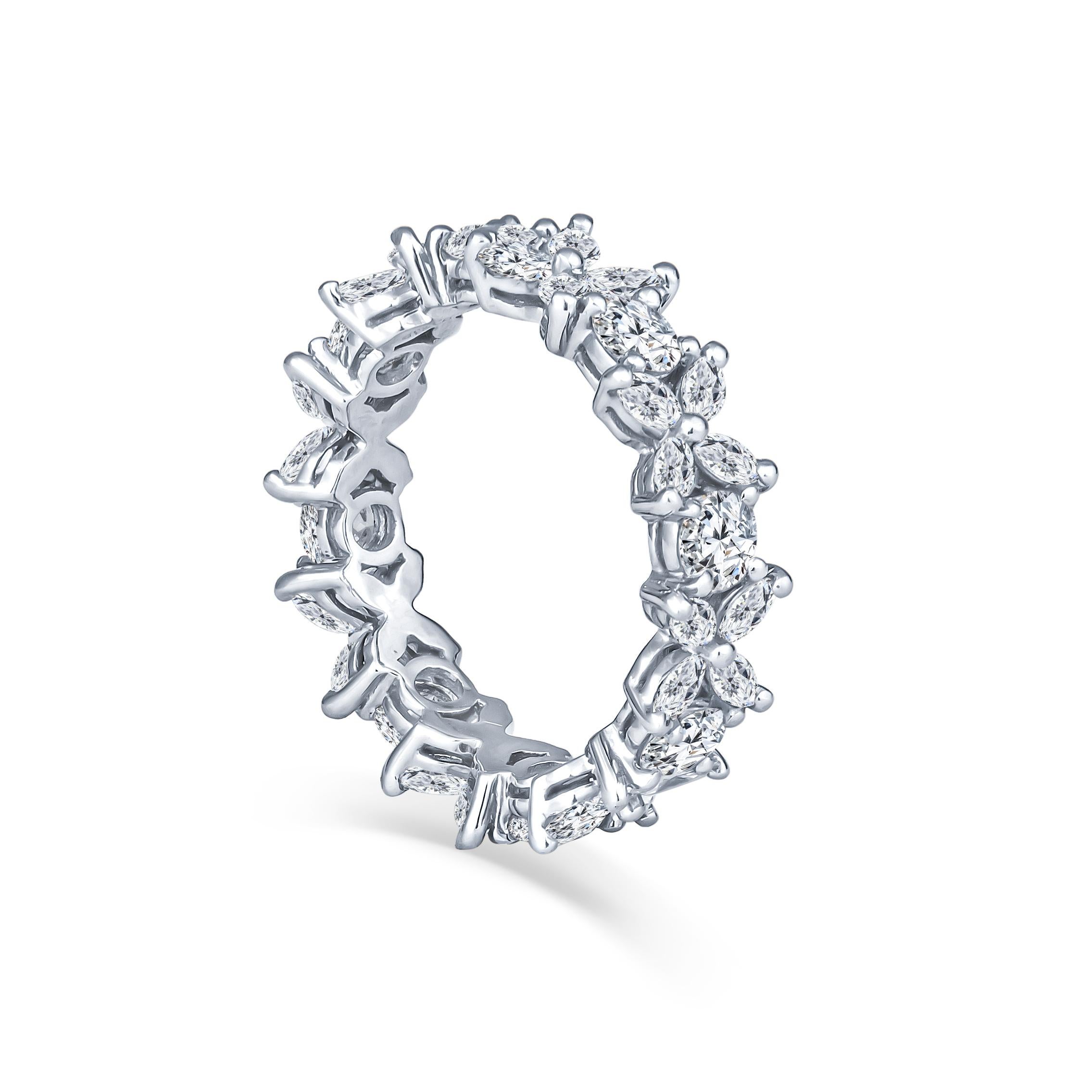 This beautiful floral Tiffany & Co. eternity band from the Victoria collection has a 1.93ct total weight in fine quality round and marquise cut diamonds, set in platinum. The MSRP is $15,200. The marquise cut diamonds make for a total carat weight