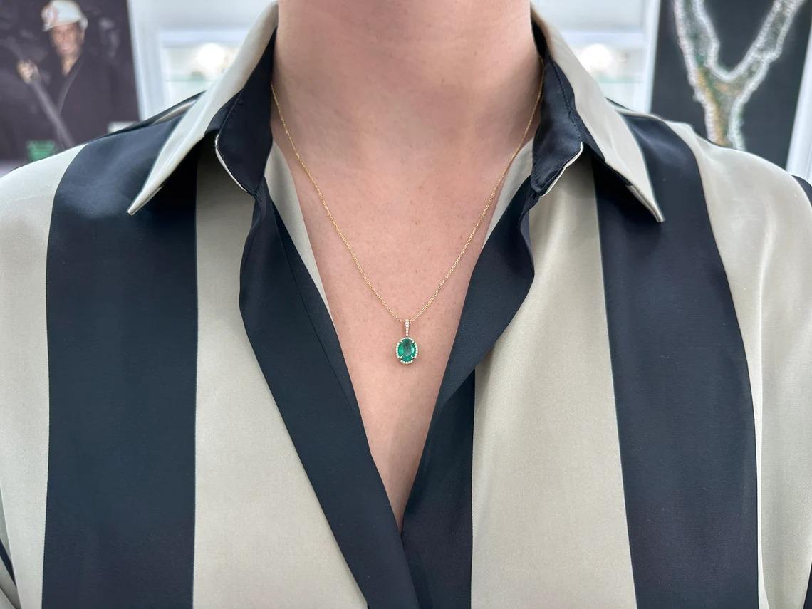 Modern 1.93tcw 14K Rich Dark Green Oval Cut Emerald & Diamond Halo Prong/Pave Pendant For Sale