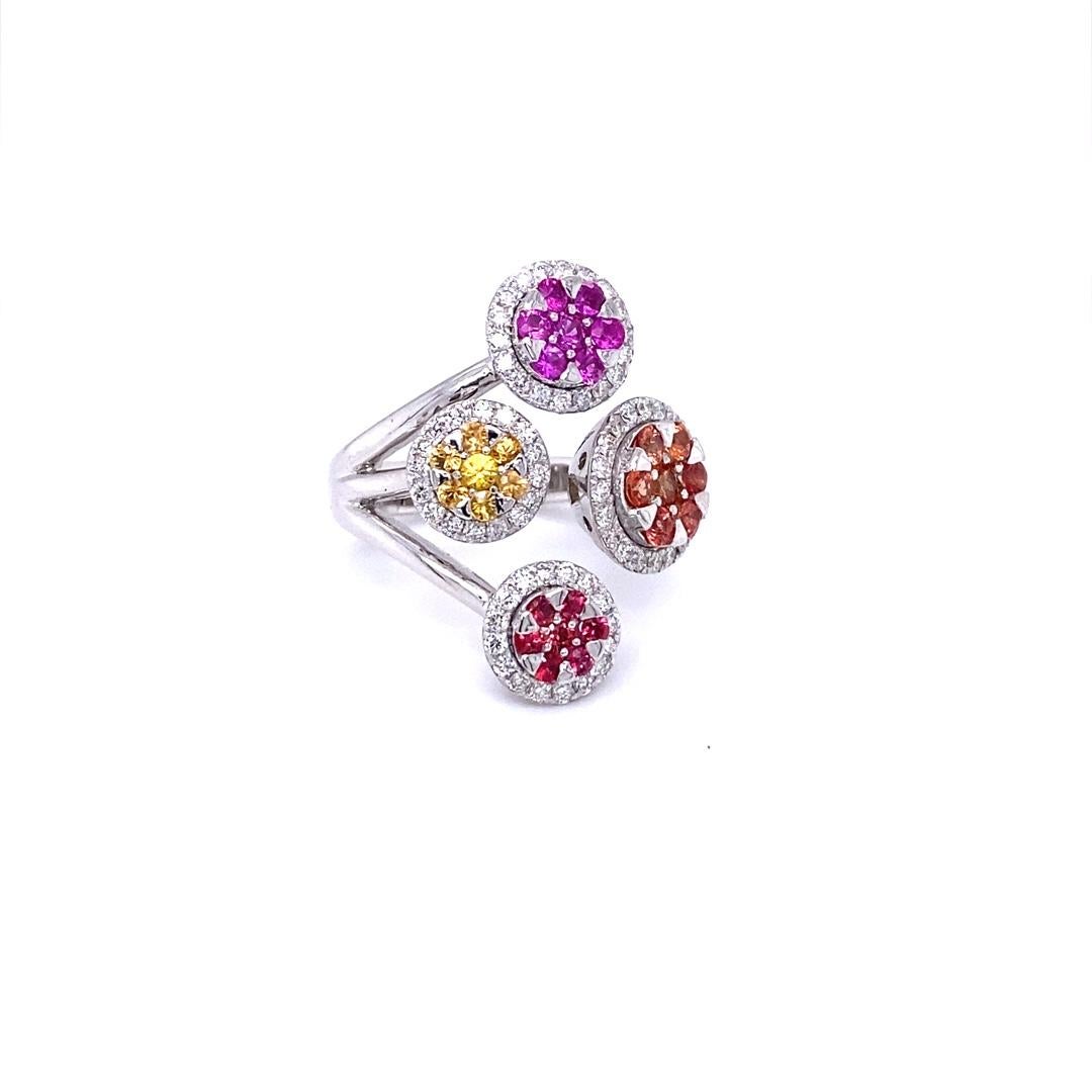 1.94 Carat Multi Color Sapphire Diamond White Gold Statement Ring

A Uniquely designed Multi-Colored Sapphire and Diamond Ring that is sure to be a great addition to your jewelry collection!  
This ring has 28 Round Cut Multi-Colored Sapphires that