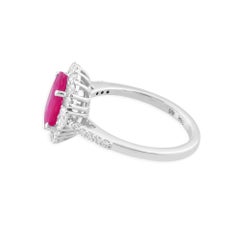 1.94 Carat Oval Ruby Gemstone Ring 0.66 Carat SI/H Diamond 18 Karat White Gold