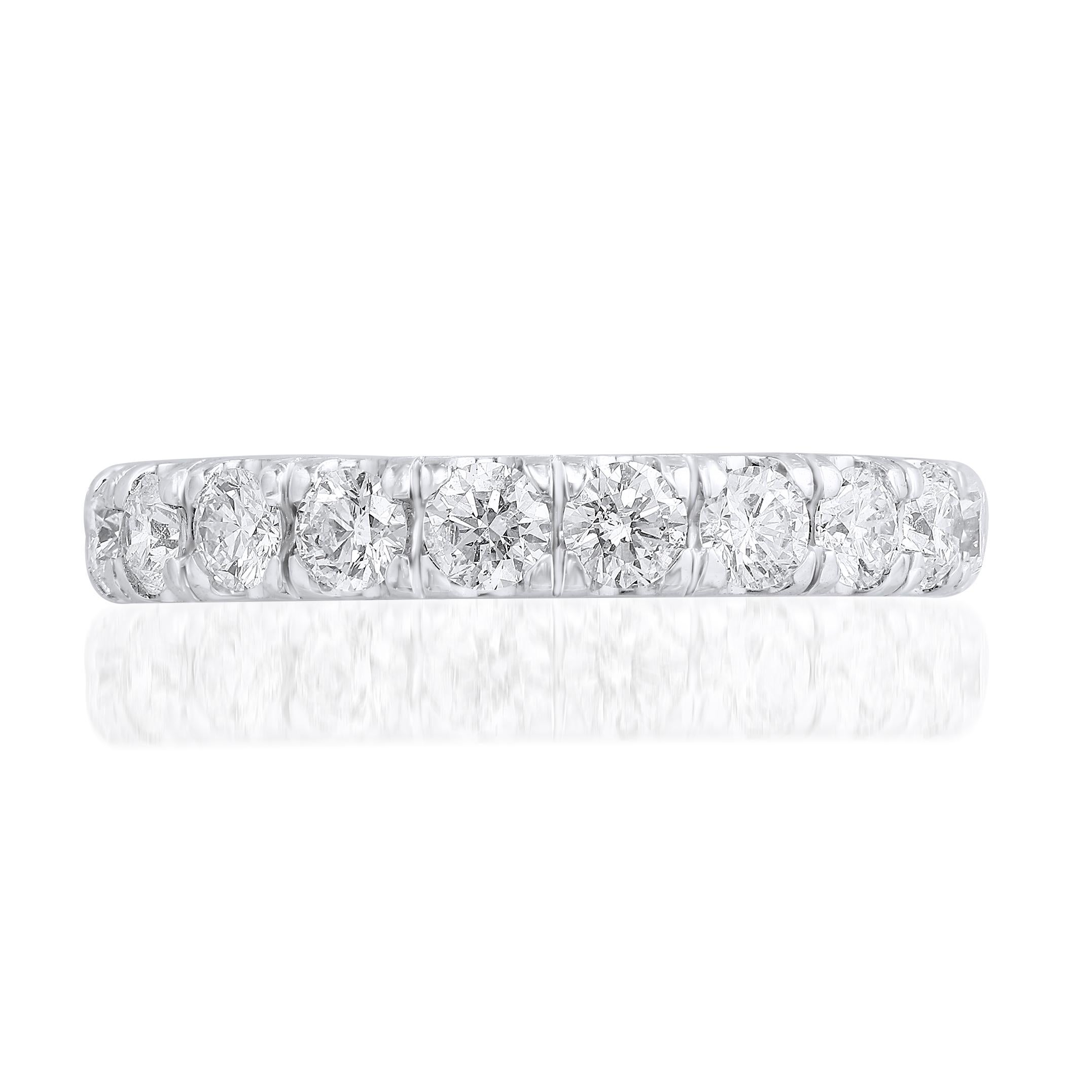 A classic and timeless eternity band style showcasing a row of round brilliant diamonds set in a 4 prong 14K white gold mounting. 20 Diamonds weigh 1.94 carats. Size 6.5 US.

Style available in different price ranges. Prices are based on your