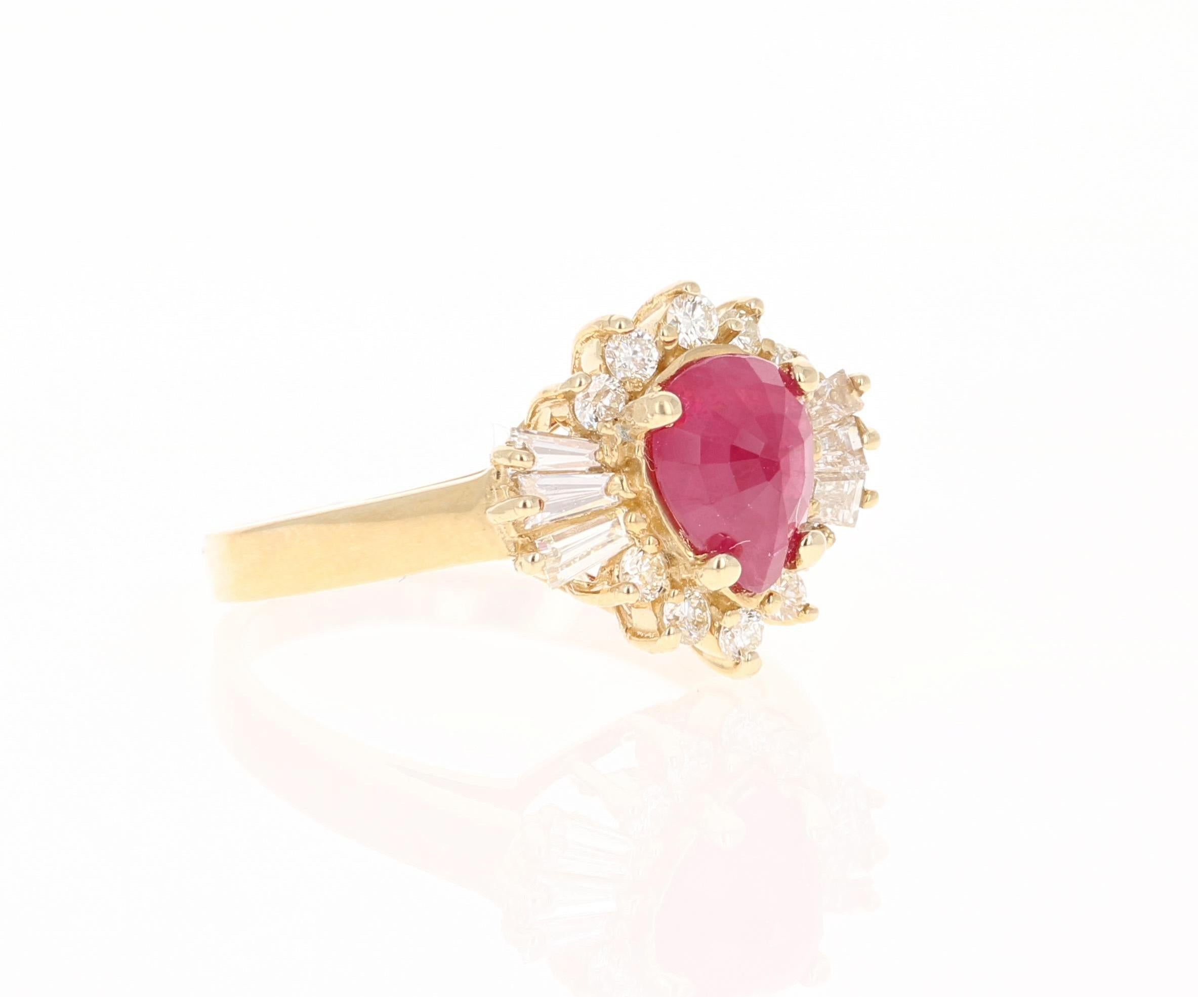 There is a Pear Cut Ruby set in the center of the ring that weighs 1.36 Carats.  There are also 10 Round Cut Diamonds that weigh 0.27 Carats (Clarity: VS, Color: H) and 6 Baguette Cut Diamonds that weigh 0.31 Carats.  (Clarity: VS, Color: H)  The