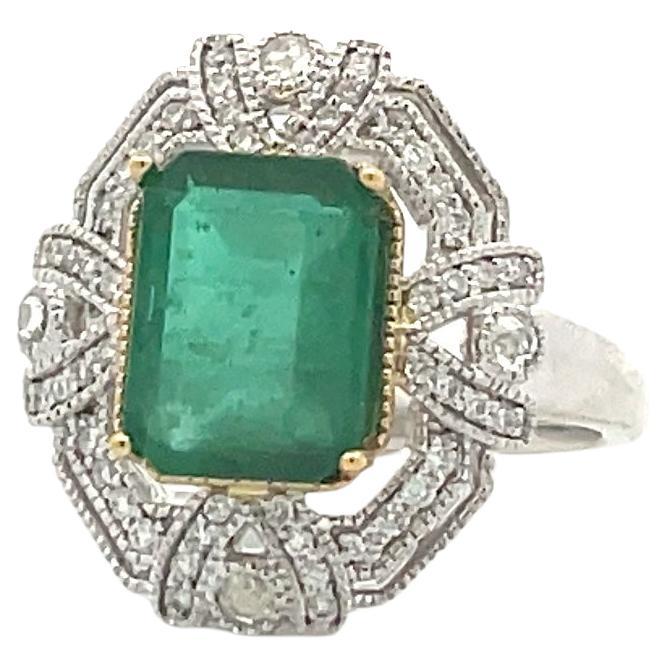 Edwardian Marquise Diamond Engagement Ring with Calibre Emerald Border