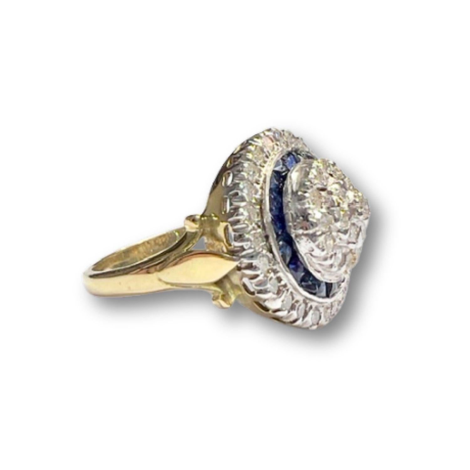 Step into the timeless glamour of the 1940s with this stunning Art Deco style ring, crafted in 18-karat yellow gold and 950 platinum, adorned with diamonds and sapphires. 

This ring is a true embodiment of elegance and sophistication, featuring a