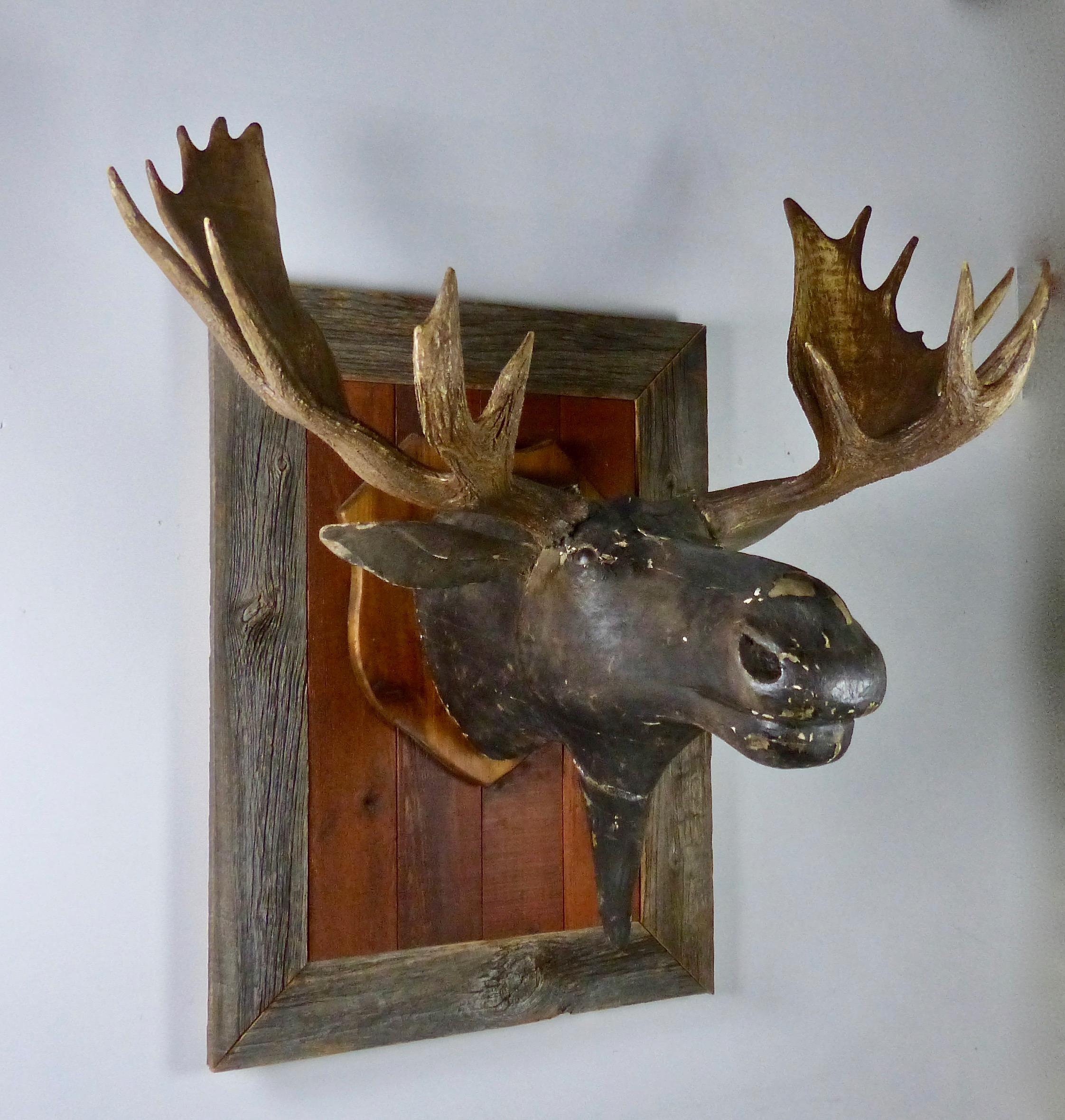 wood carved moose head