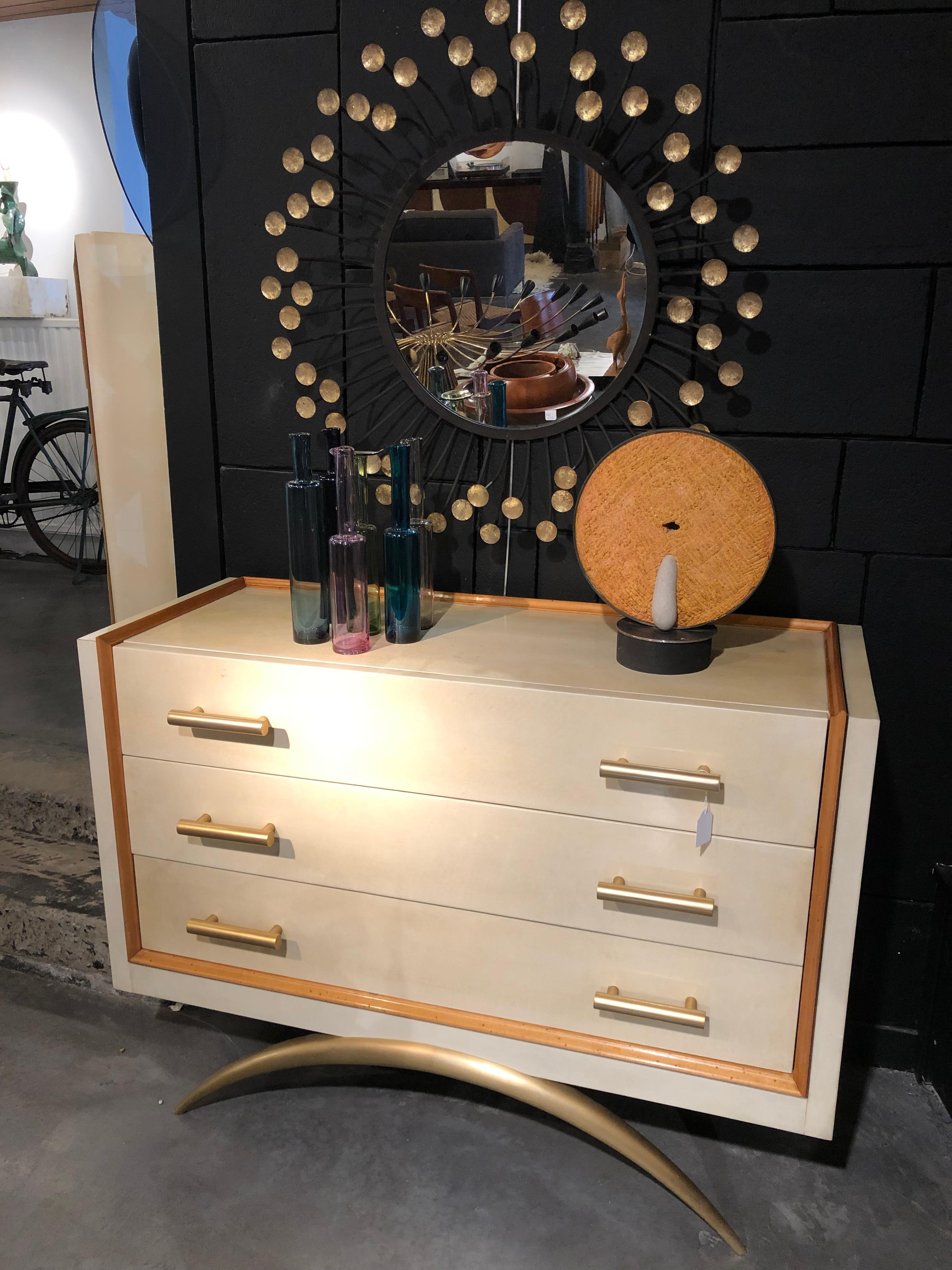 Beautiful and original chest of drawers made by Andre
Domin and Marcel Genevriere for Maison Dominique 
There is a stamp in the structure under the drawers 
The chest is made of solid wood with a parchment veneer
She’s standing on 2 arch in