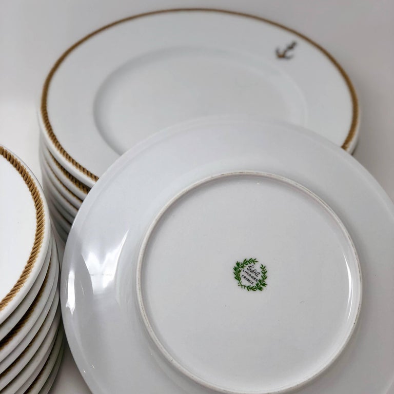 1940 GDA Limoges Plates Set, Gold and Black Rim with an Anchor Shield