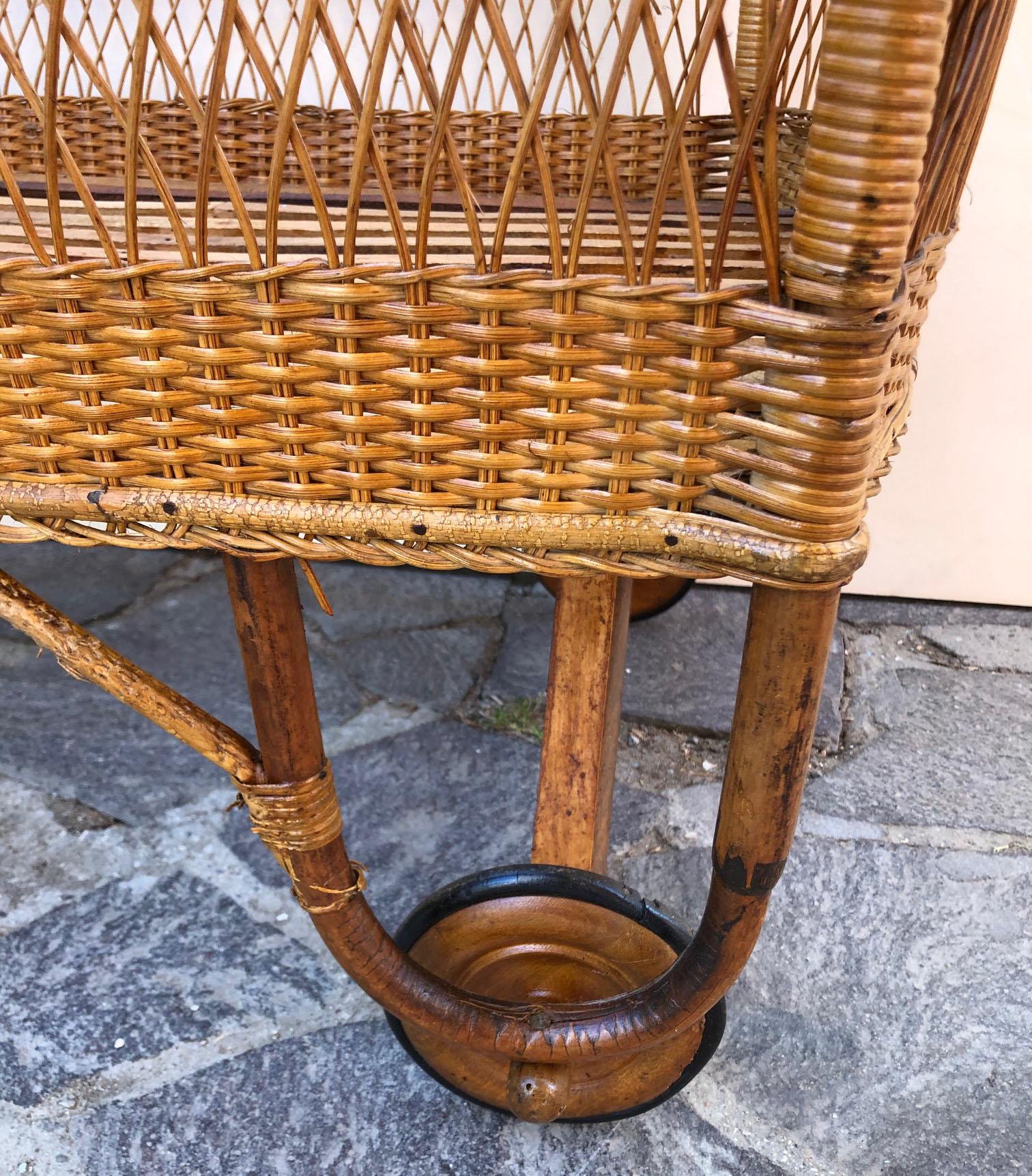 vintage wicker baby bassinet on wheels
