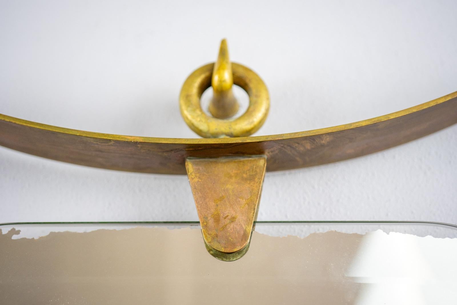 Brass 1940 italian mirror in brass and patina , with hook in cast bronze