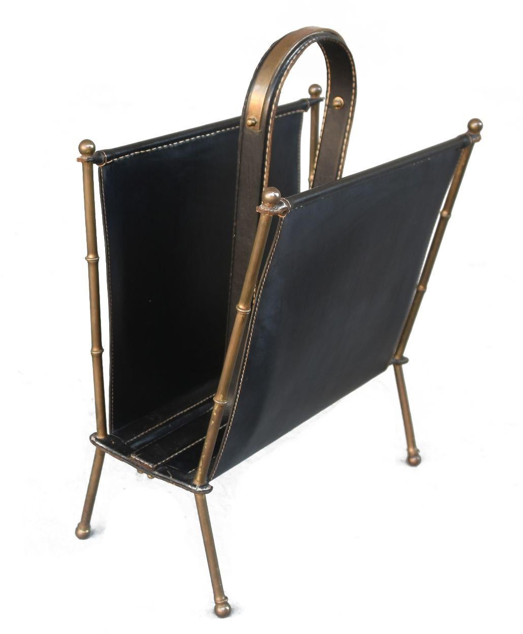 Jacques Adnet Magazine stand 1940 in brass and stitched leather.