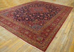 1940s Inspiring Navy Blue and Red Central Medallion Antique Kashan Rug