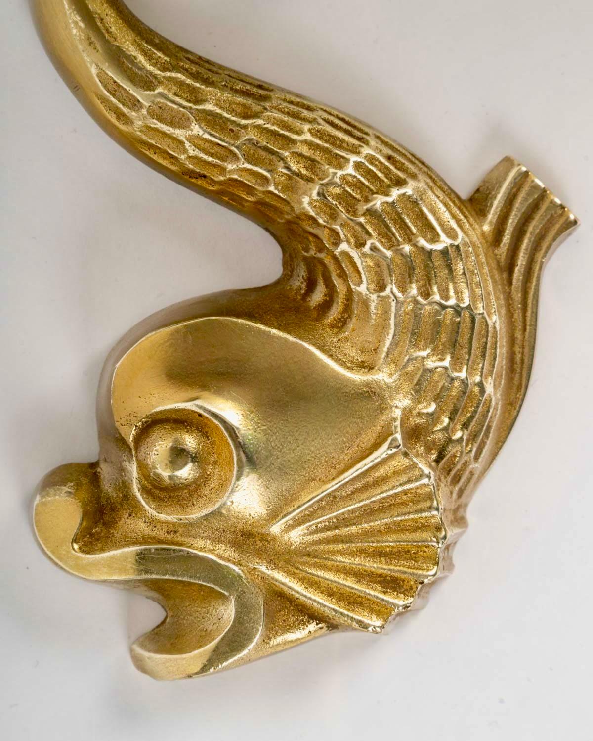 Paire de lampes murales en bronze 
