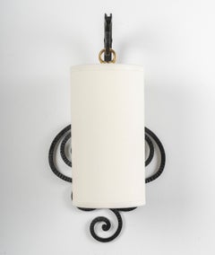 1940 Ein Paar schmiedeeiserne Wandleuchter von Maison Cheret