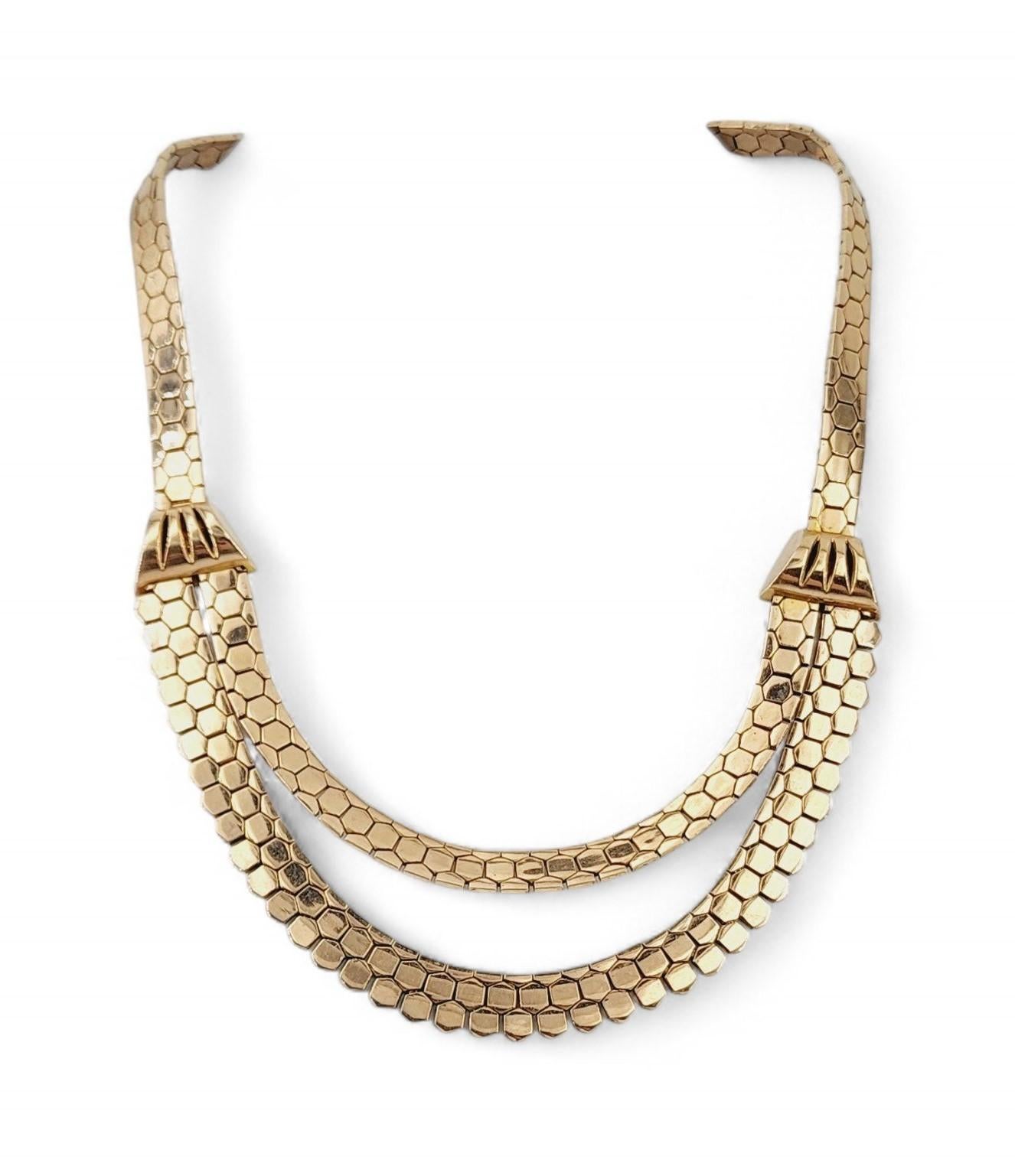 Betreten Sie das Reich der zeitlosen Eleganz mit dieser wunderschönen, doppelreihigen Wabenkette aus 18k Gelbgold im Retro-Stil, einer atemberaubenden Verschmelzung von Vintage-Charme und zeitgenössischem Charme. Diese mit viel Liebe zum Detail