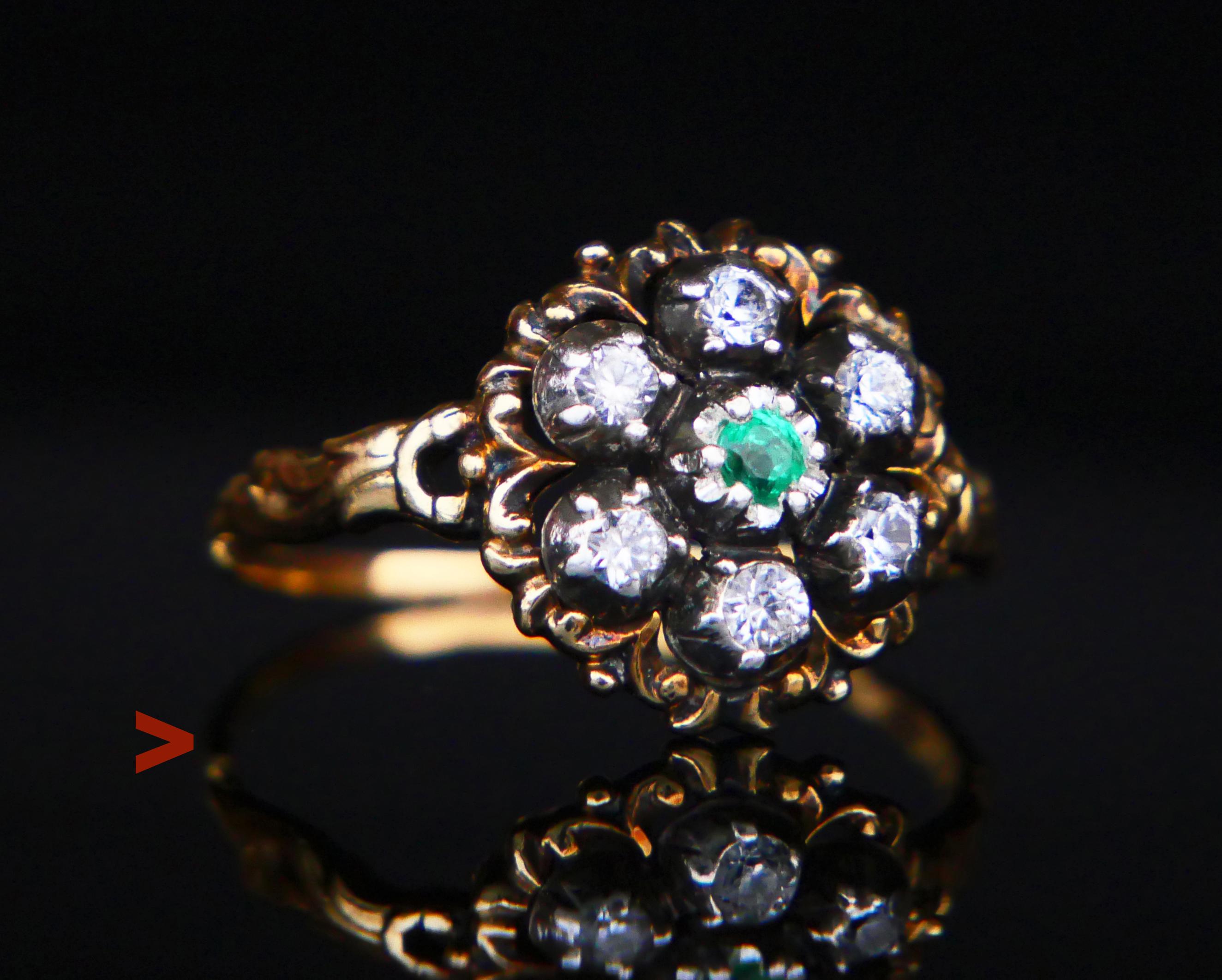 A  Ring with carved band and crown decorated with natural diamond cut Emerald Ø 2.5 mm / ca. 0.1 ct accented with six old diamond cut natural White Sapphires  Ø2.5 mm / 0.1 ct each,  total weight ca. 0.6 ctw. Stones in Silver clusters with open