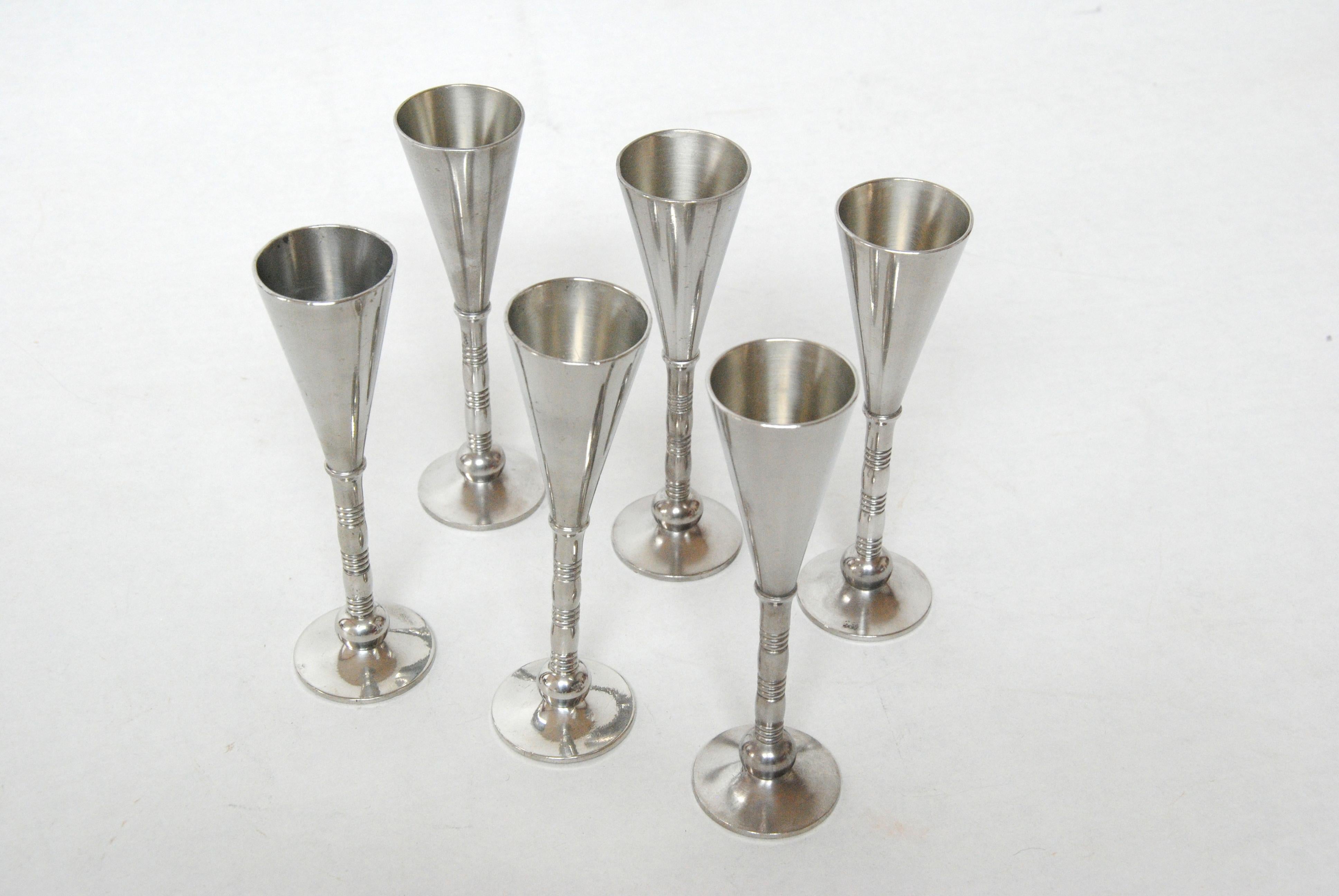 1940´s Danish Just Andersen set of six pewter schnapss liquor goblets.

Stylish vintage Schnapss Liquor Goblets in very good vintage condition that after 80 years will still do very well in your bar cabinet.

Just Andersen 1884-1943 was born in