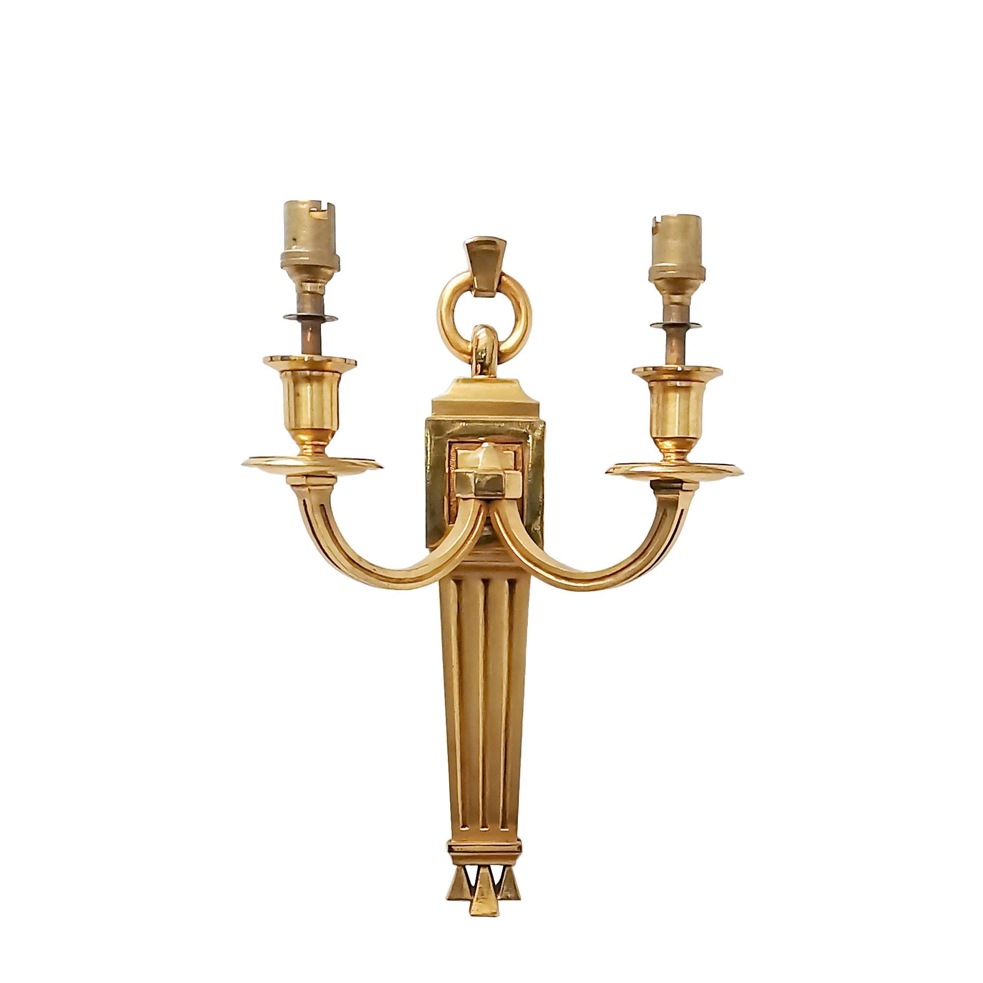 Set of four neoclassical wall lights in golden bronze, two lights (bayonette bulbs). High quality.

France c. 1940.