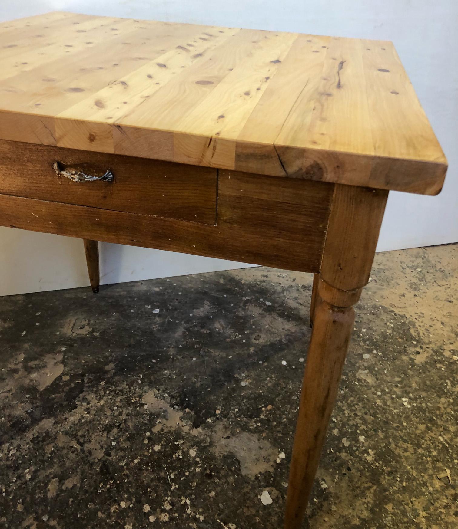 Uncommon Table in solid cypress, chestnut and fir, two-tone, Italian, natural honey-colored top, very sturdy, with drawer.
Shellac and wax finish. 
Very sturdy and solid. 
Legroom in height 62cm.
Comes from an old country house in the Chianti area