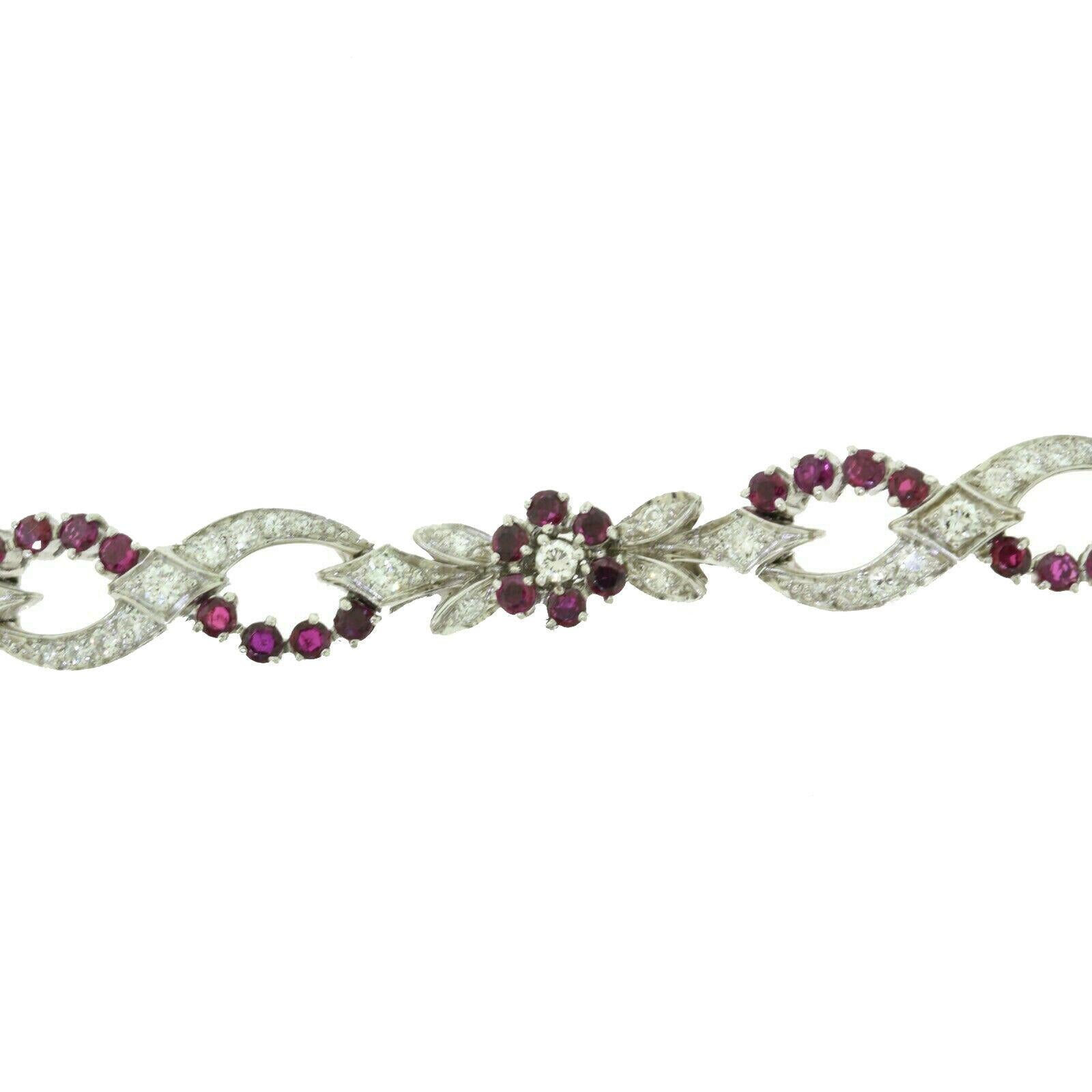 Brilliance Jewels, Miami
Questions? Call Us Anytime!
786,482,8100

Designer: Tiffany & Co.

Style: Diamond and Ruby Floral Bracelet

Metal: Platinum 950

Stones: 36 Round Rubies, 46 Round Brilliant Cut Diamonds

Bracelet Length: 7