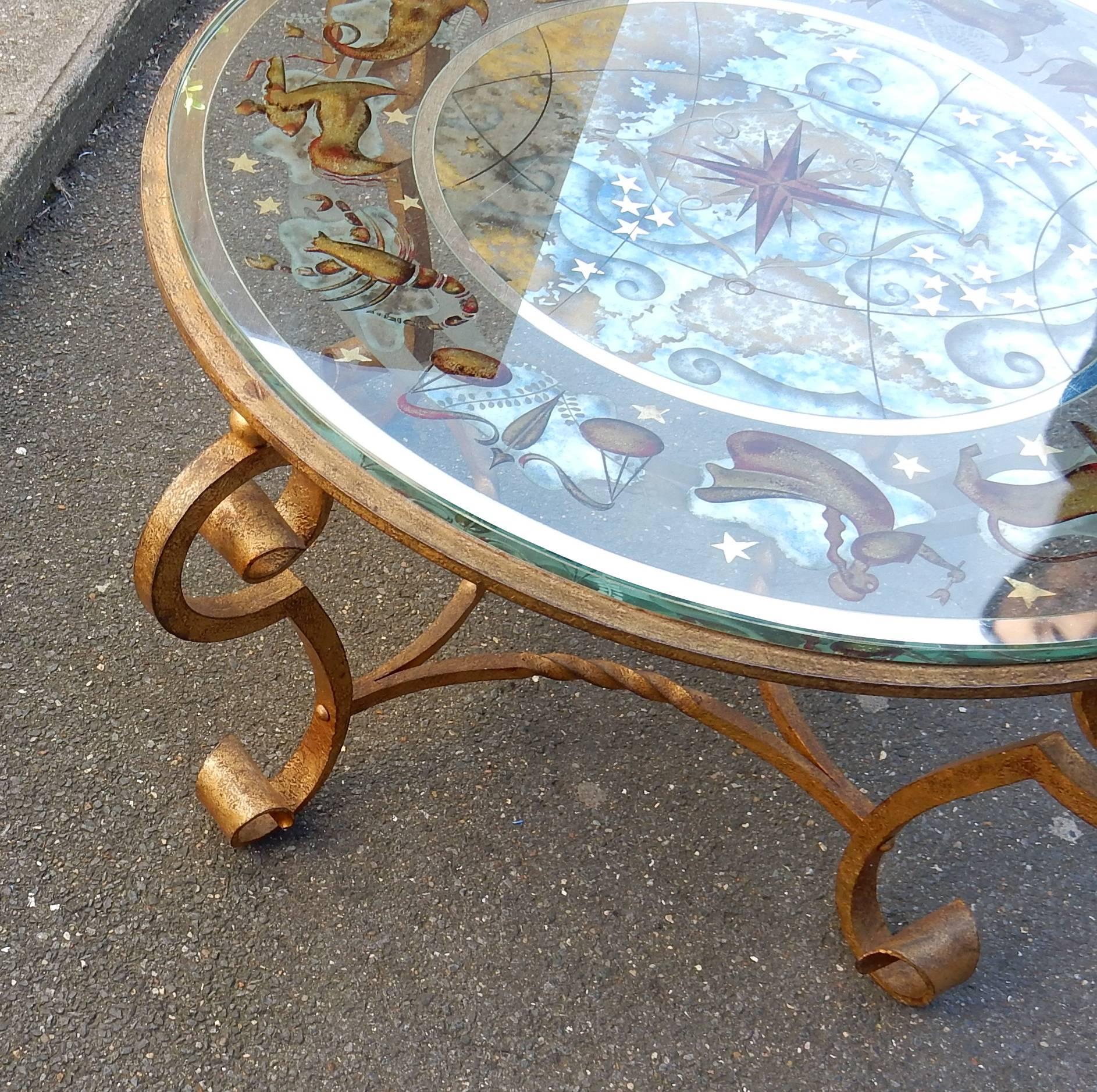 French 1940-1950 Coffee Table Has Decoration of Zodiac in the Style of Poillerat