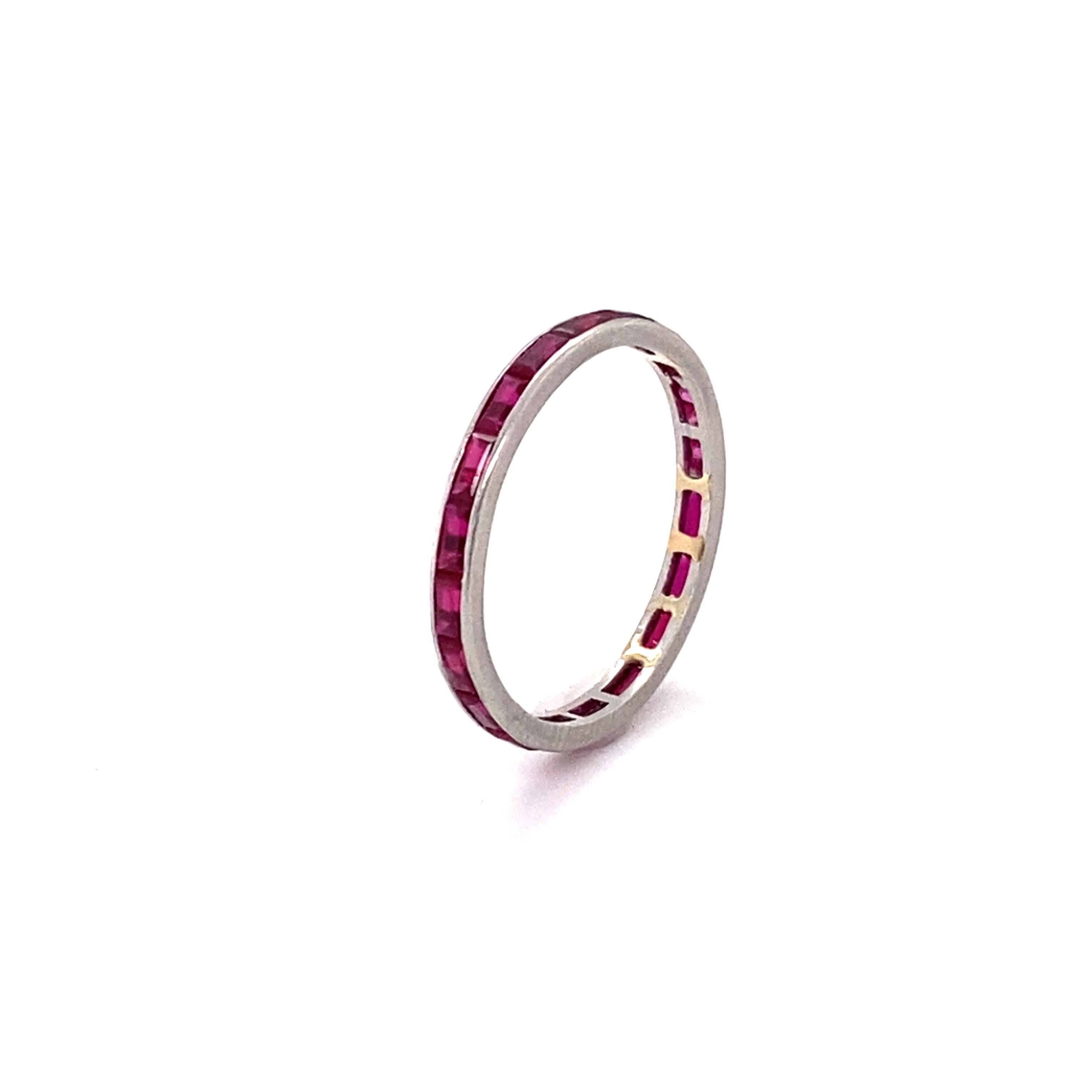 Item Details:
Metal Type: Platinum
Weight: 1.3 grams
Size: 5.75 (not resizable)
1940s

Ruby Details:
Cut: French Baguettes
Carat: 0.40
Color: Vivid Red

Item Features:
This Beautiful Retro eternity band is very well made with 0.40 carat French