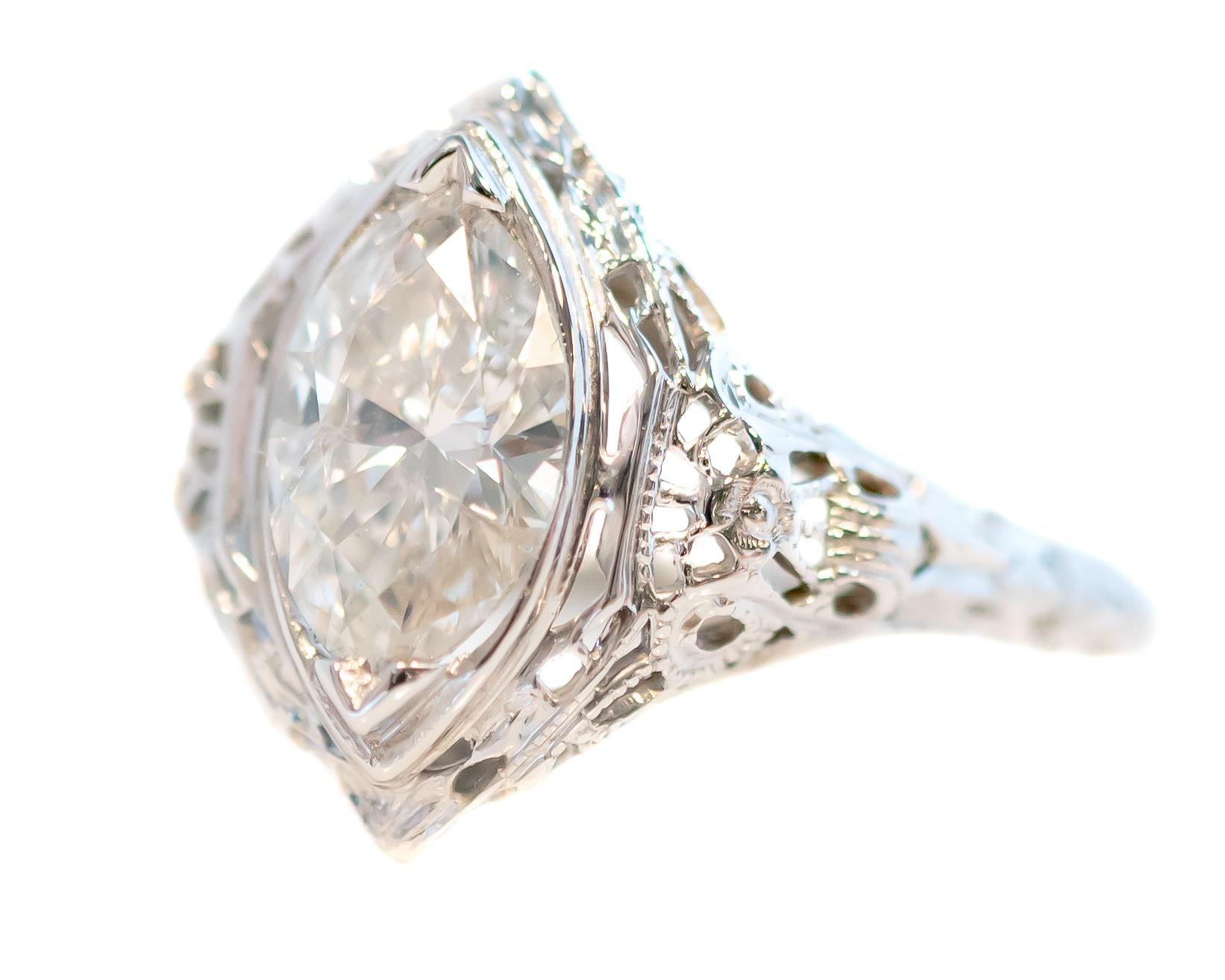 1940s Marquise Diamond Ring - 18 Karat White Gold, Diamond

Features:
1.0 carat Marquise cut Diamond
18 Karat White Gold Filigree setting
Marquise shape
Decorative embellishment throughout the setting and on the top, side and bottom of the
