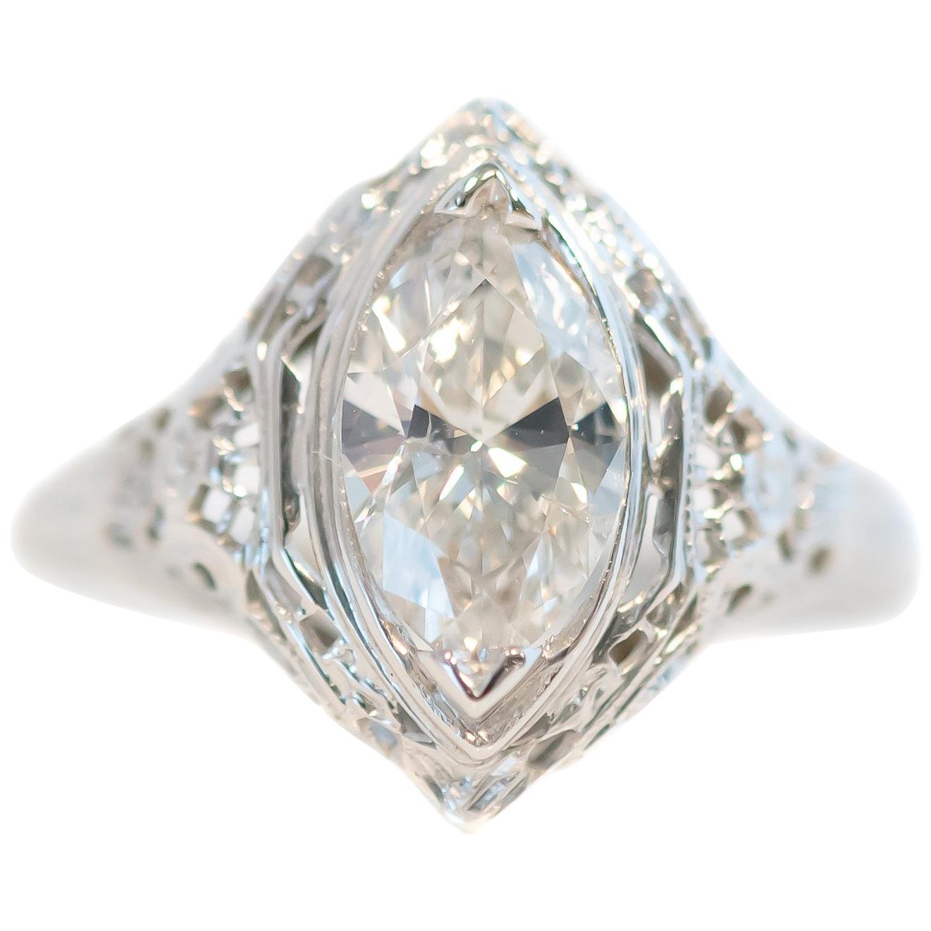 1940s 1 Carat Marquise Diamond Solitaire and 18 Karat White Gold Filigree Ring