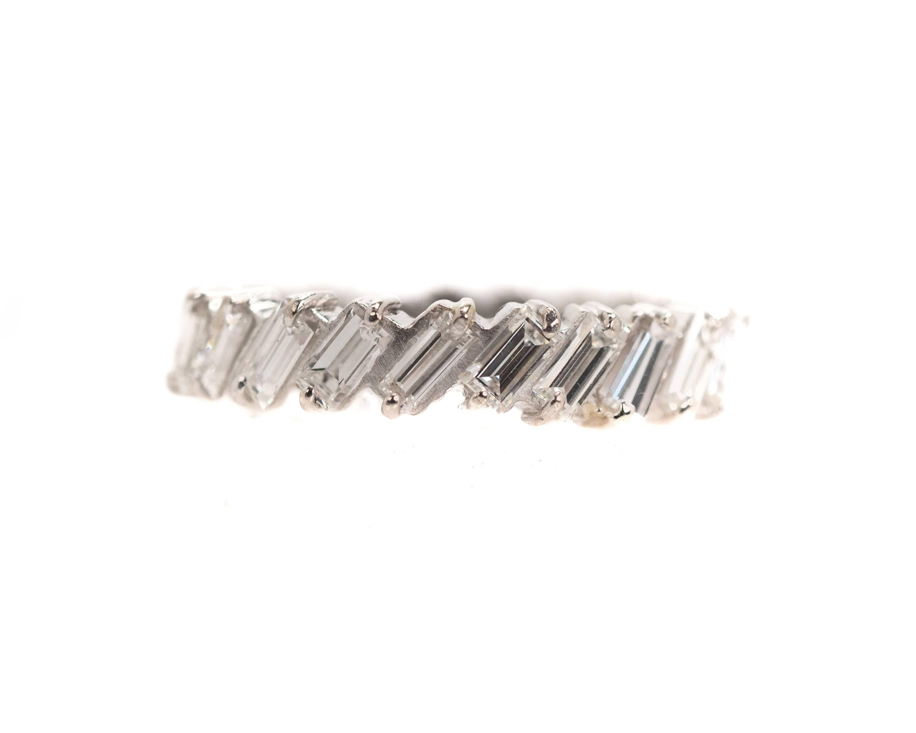 1940s Half Way Around Eternity Band - 14K White Gold, Baguette Diamonds

Features a half circle of Baguette Diamonds set in 14K White Gold. The front half of the ring is set with Glittering Baguette Diamonds. The back half of the ring is Glimmering